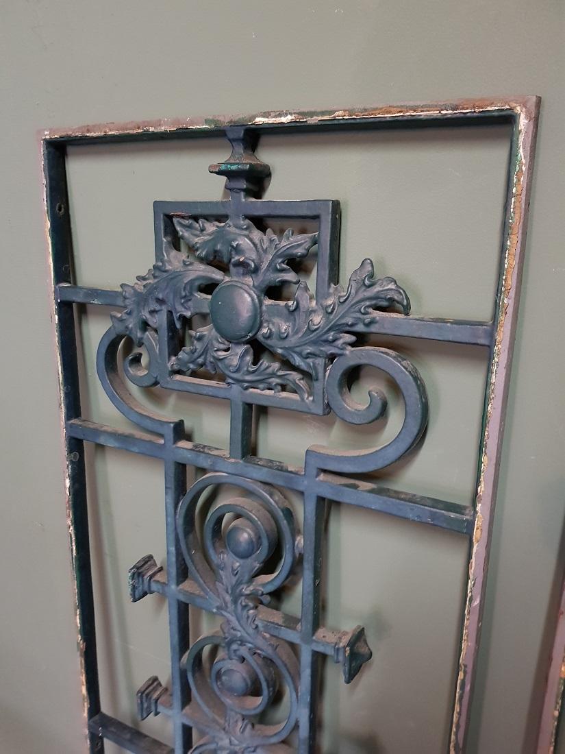 Set large and heavy French cast iron door fences for decoration and protection for the window, decorated with leaves and curls, these are in good but used condition. Originating from the mid-20th century.

The measurements are,
Depth 2 cm/ 0.7
