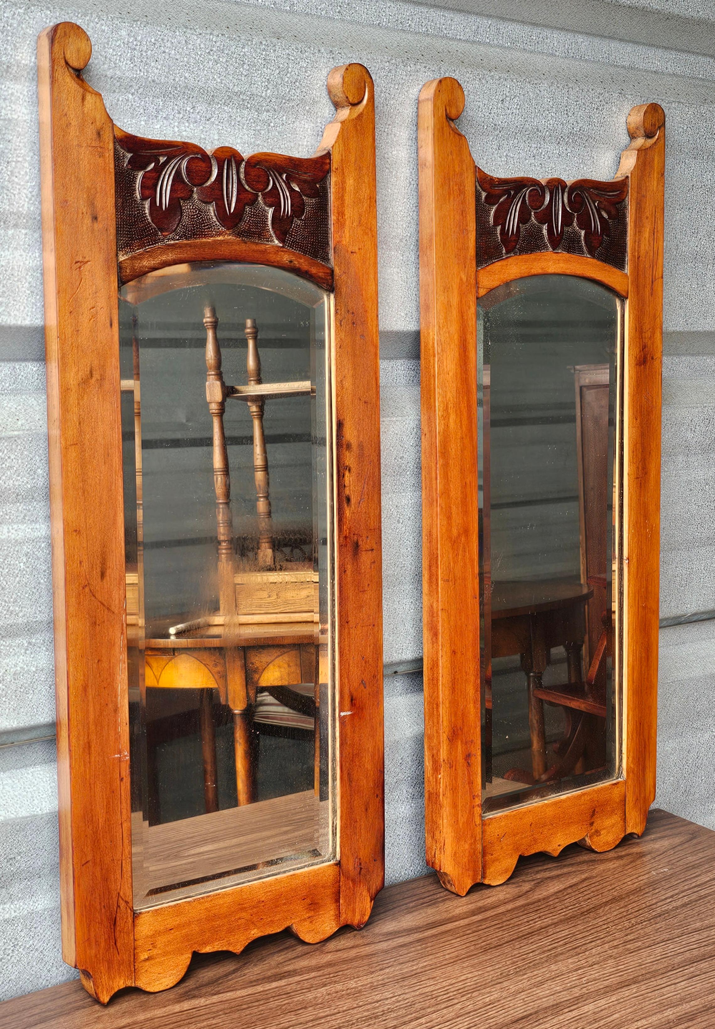 A Pair of 19th Century Victorian Carved Maple Frame Wall Mirrors
Measures 11.5