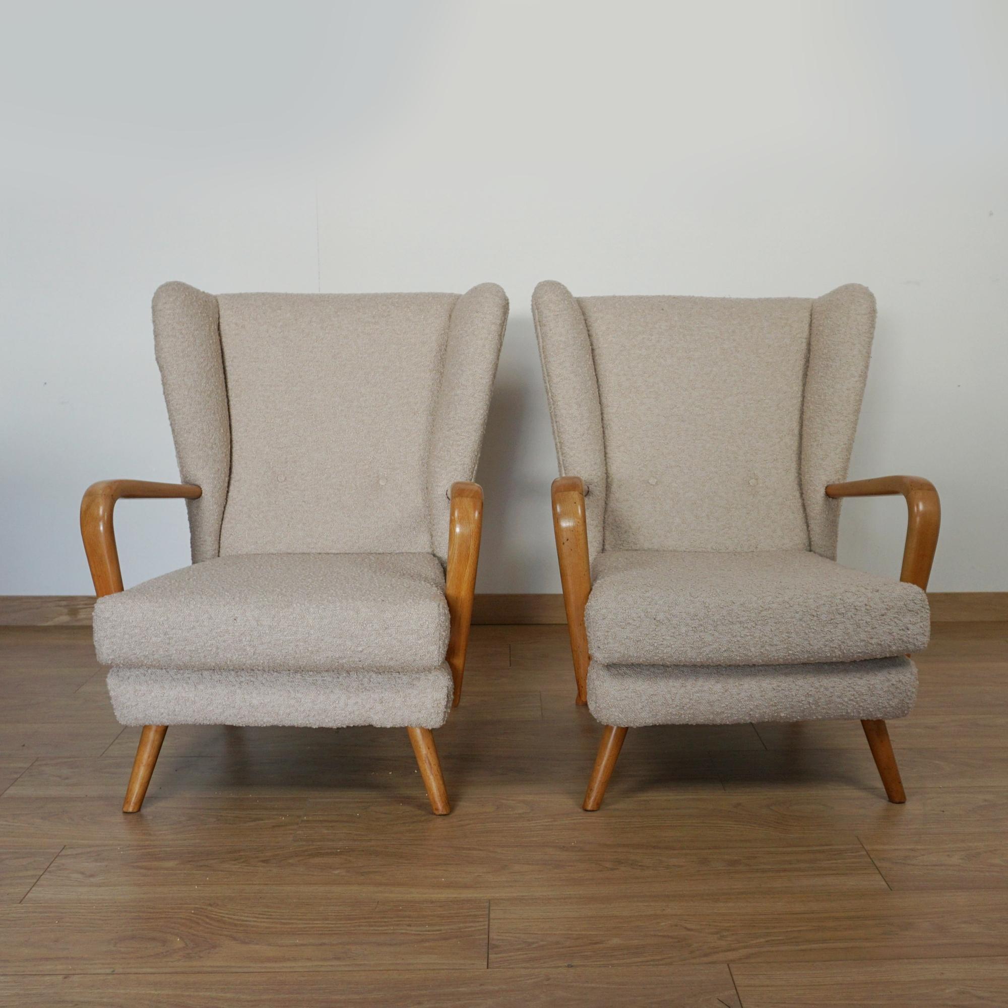 A pair of Mid-Century 'Bambino' armchairs designed by Howard Keith for HK Furniture. Solid beech, re-upholstered in bouclé.

Dimensions: H 88cm W 66cm D 65cm Seat H 40cm

