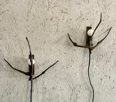 A Pair of Mid Century Brutalist Bronze Sconces in the style of Francois Thevenin