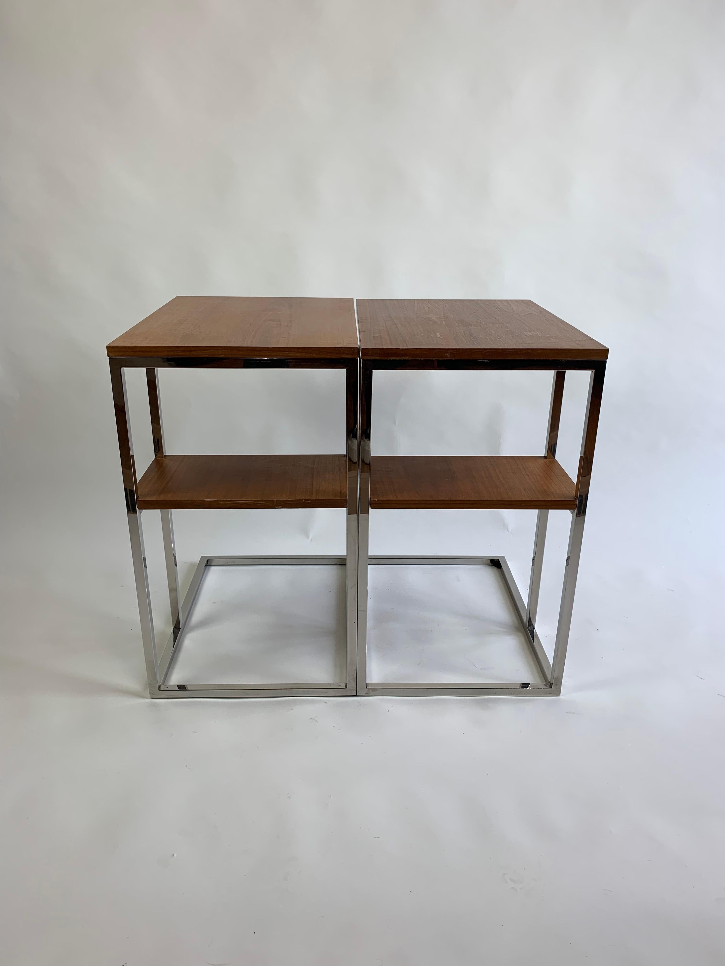 A pair of stunning midcentury Rectangular shaped side tables, in wood and chrome. Wear is consistent with age but in good condition.