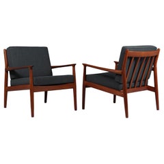 Pair of Mid century Danish Solid Teak framed Armchairs with upholstered cushions