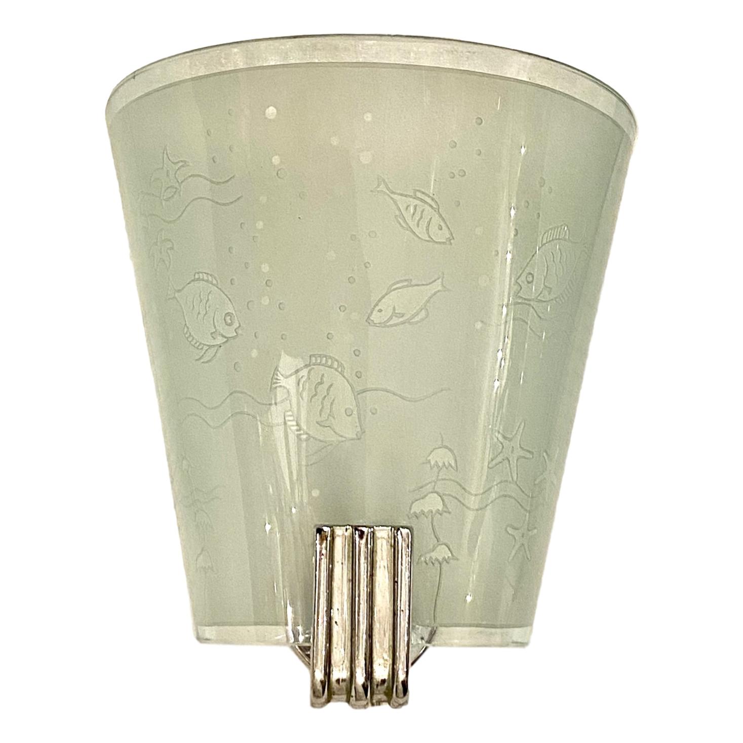 A pair of circa 1960s Italian etched glass slip shade sconces with a fish motif and single interior candelabra light.

Measurements:
Height 8