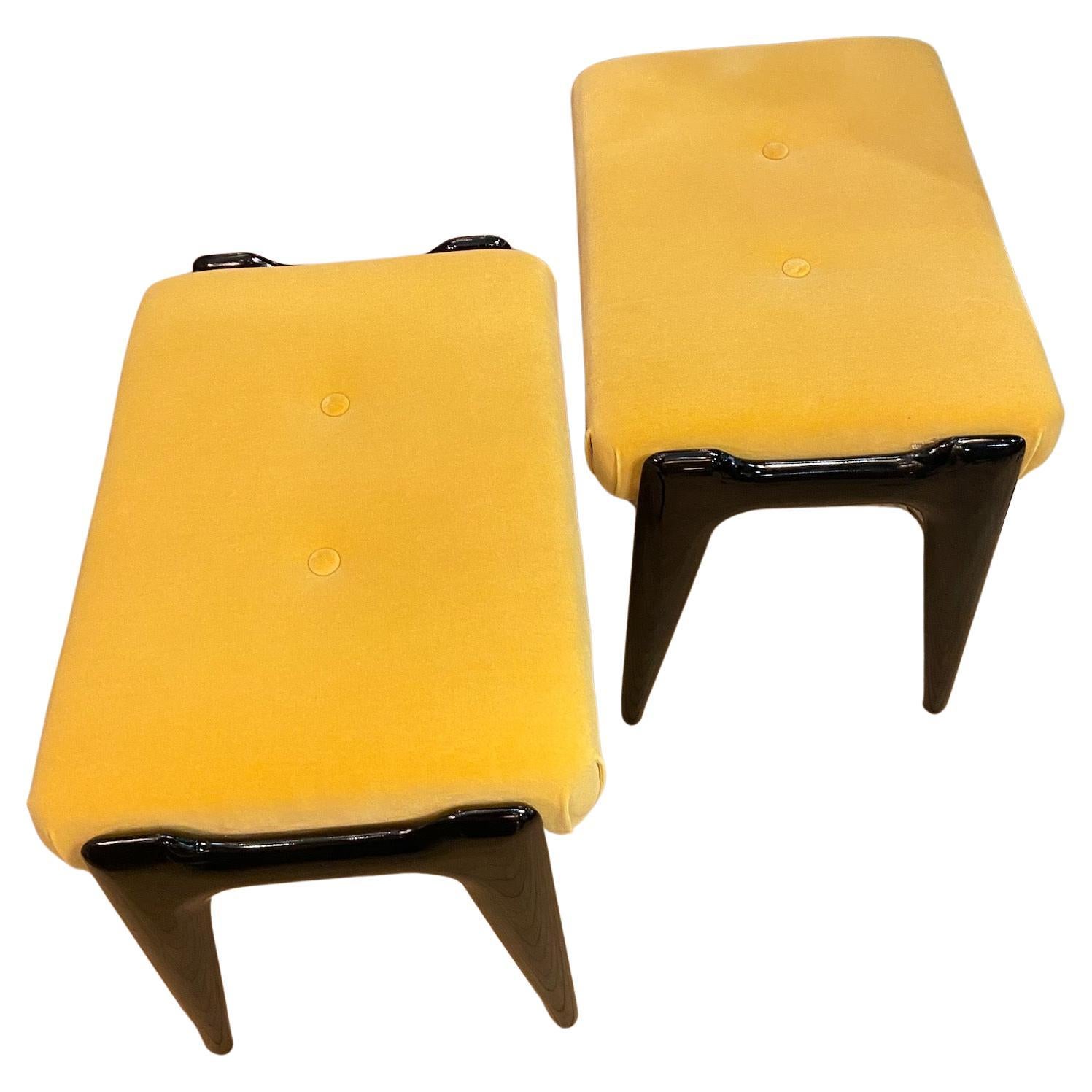 A pair of 1950's Italian stools, yellow velour and ebonized organic wooden legs. In the manner of Ico Parisi.
