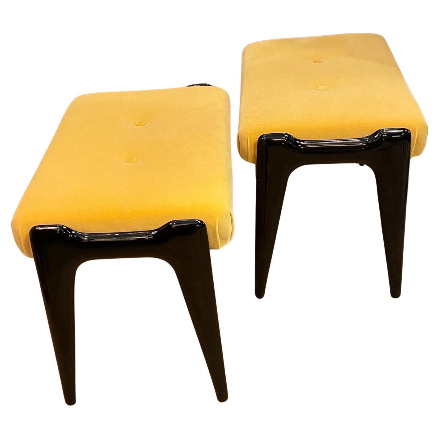 Mid-Century Modern A pair of mid-century Italian stools, yellow velour and ebonized wooden legs