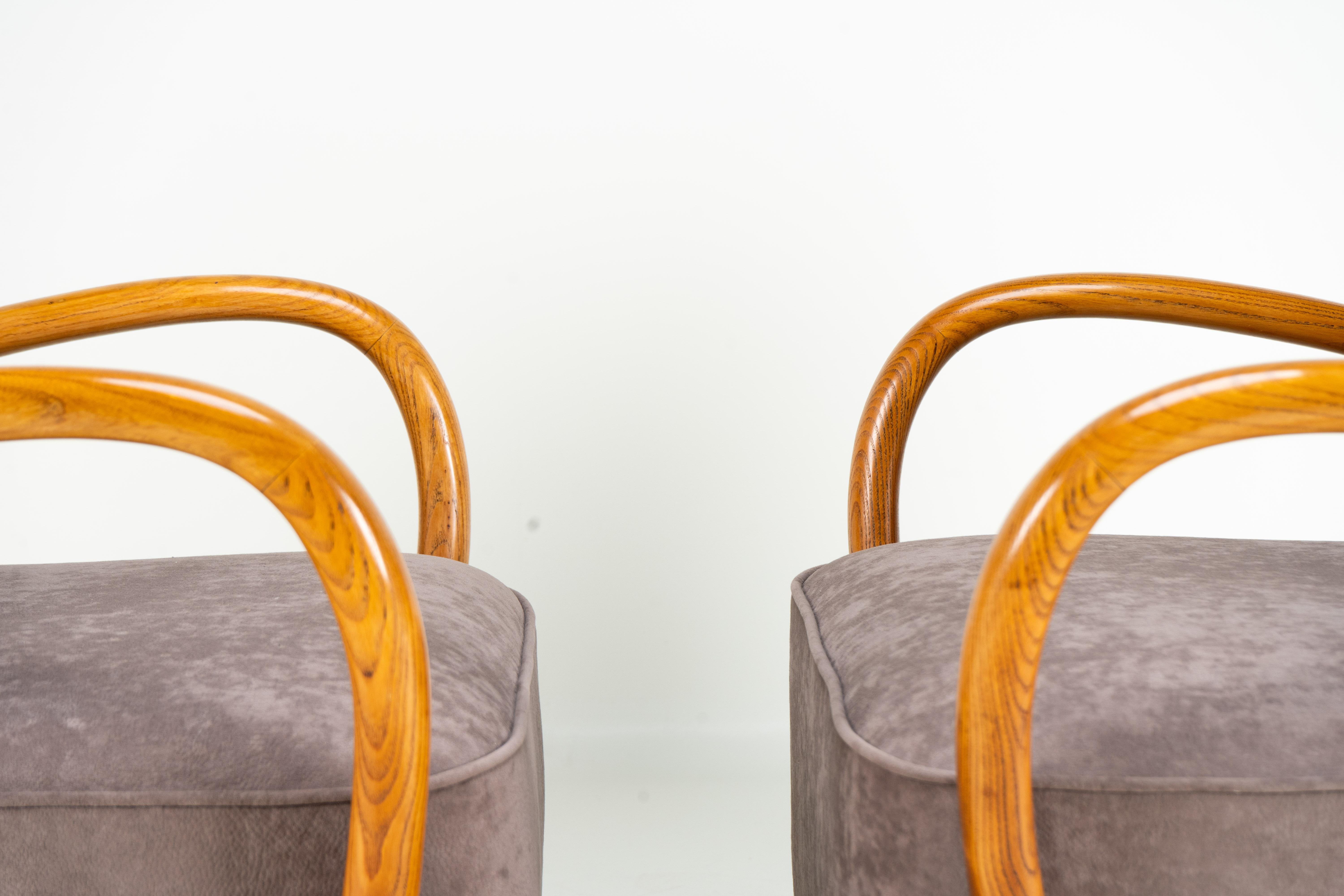 Paire de chaises longues du milieu du siècle avec accoudoirs en Wood Wood en vente 3