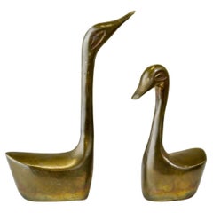 A pair of mid-century modern cast bronze duck figurines, circa 1970s.