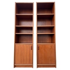 A pair of Mid Century Modern Danish Bookcases with Storage Cabinets. Circa 1970s