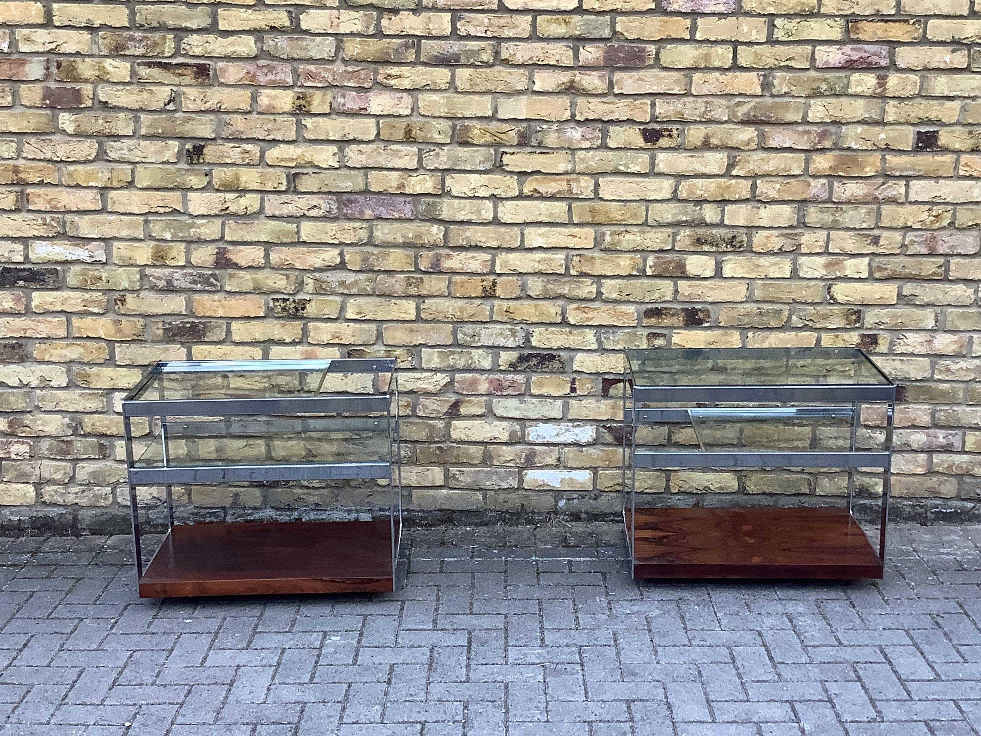 A pair of Mid Century cocktail trolley chrome & glass shelves designed by Richard Young for Merrow & Associates