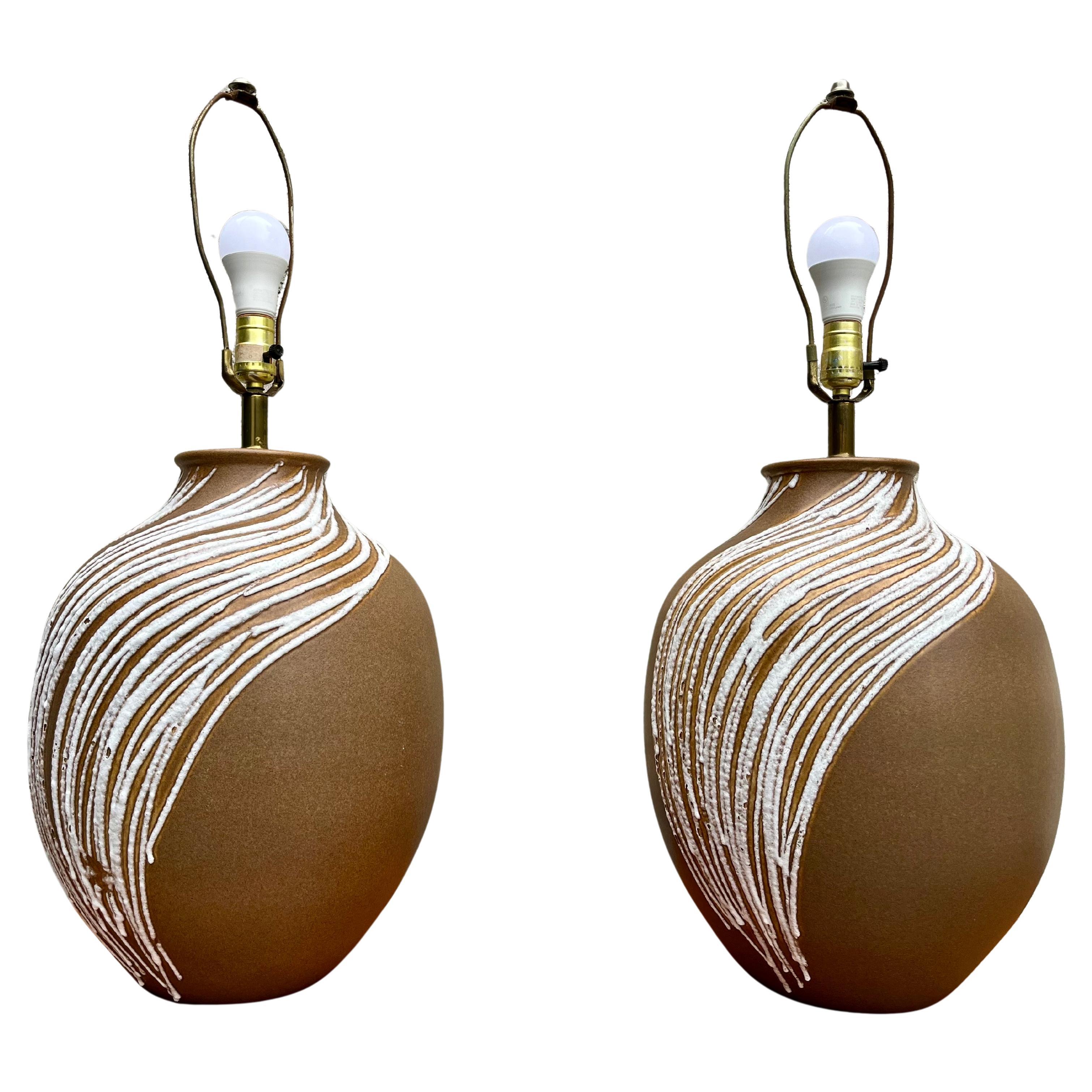 A Pair of Mid Century Modern Large Lava Glazed Ceramic Lamps. Circa 1960s
