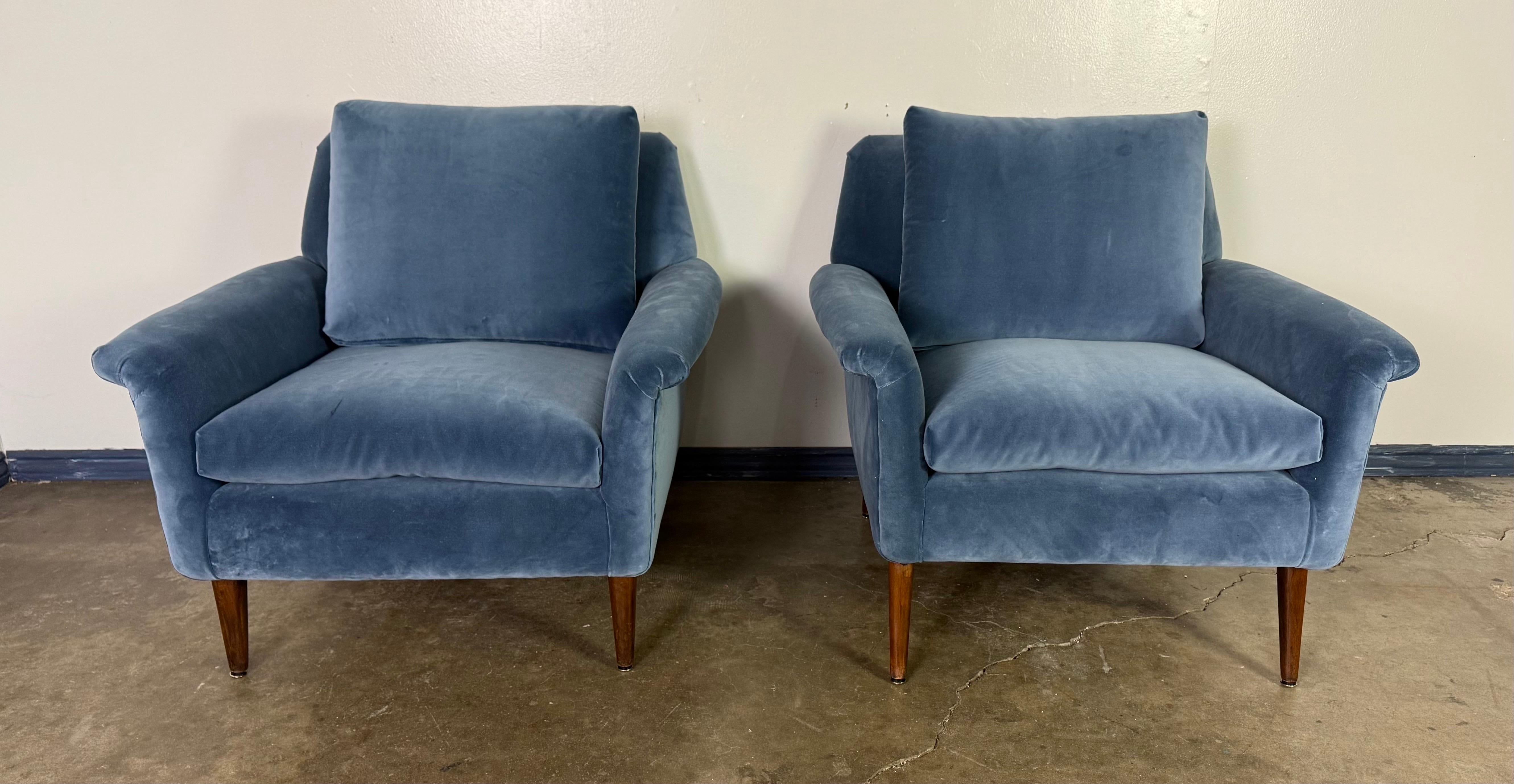 Swedish A pair of Mid-Century Modern lounge chairs designed by Folke Ohlsson For Sale