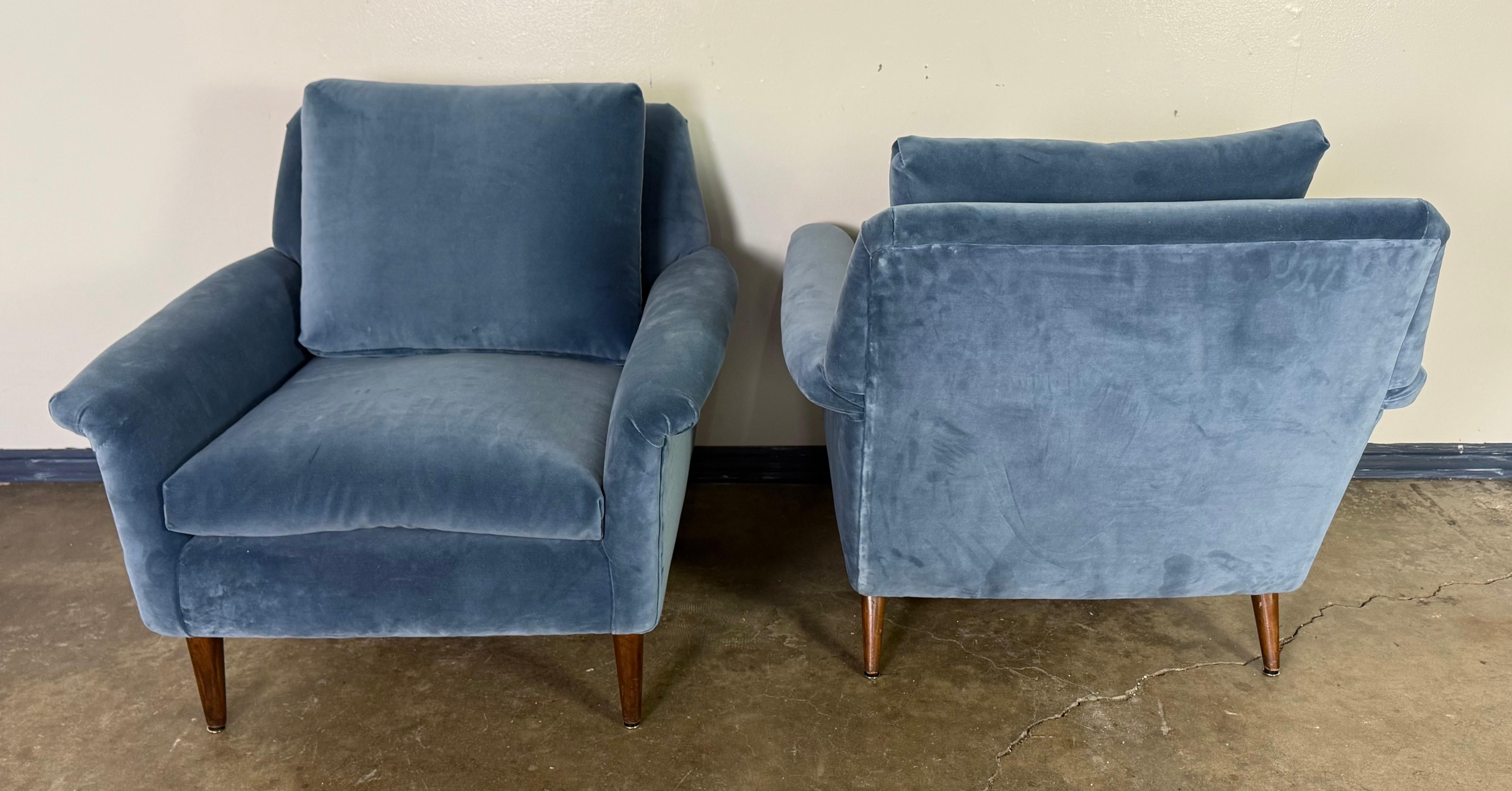 A pair of Mid-Century Modern lounge chairs designed by Folke Ohlsson For Sale 2