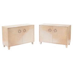 Pair of Mid-Century Modern Parchment Covered Cabinets with Brass Hardware in t