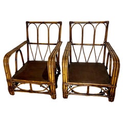 Vintage A pair of Mid Century Modern Rattan Club Chairs