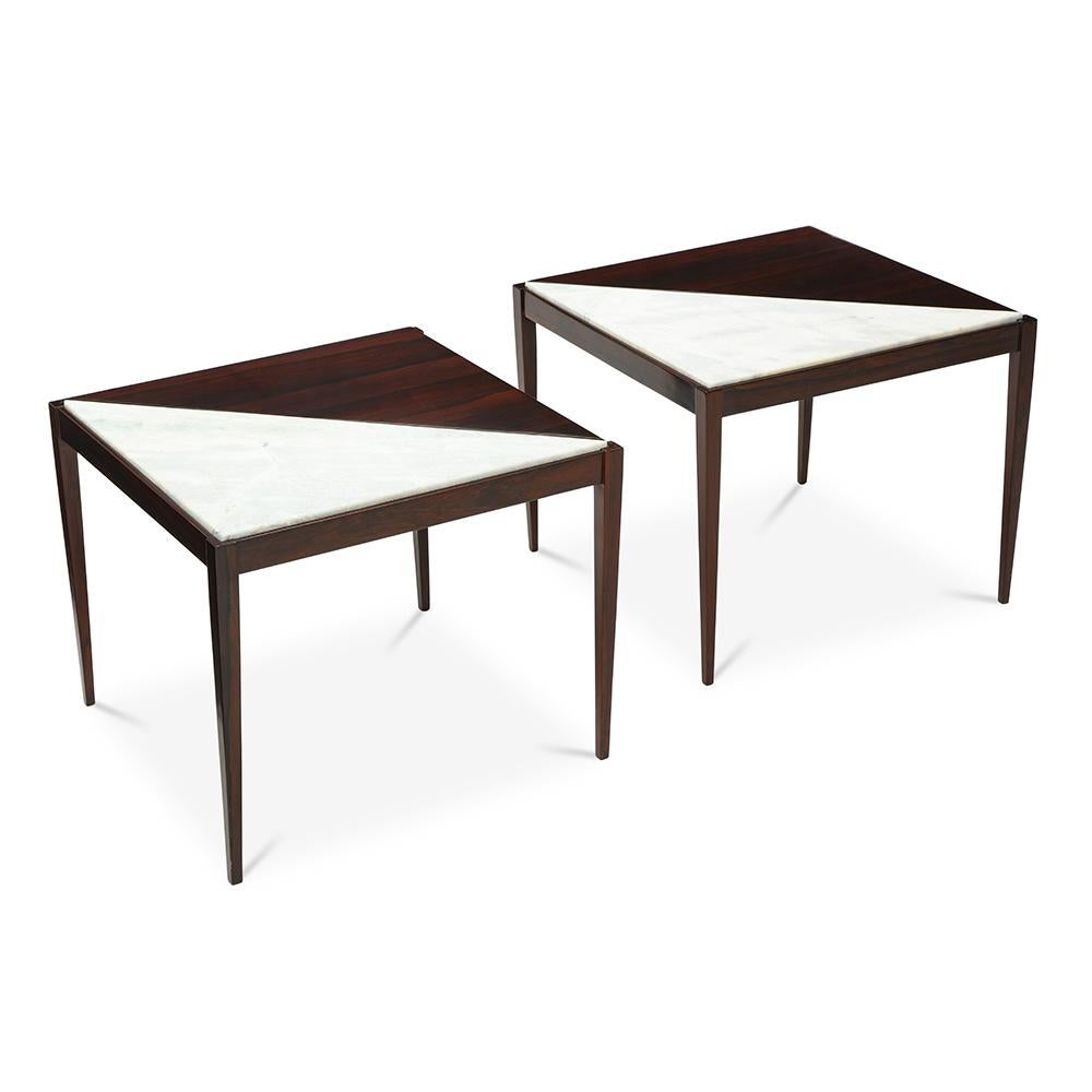 A pair of Mid-Century Modern side tables, circa 1950. Rosewood with marble inserts.
  