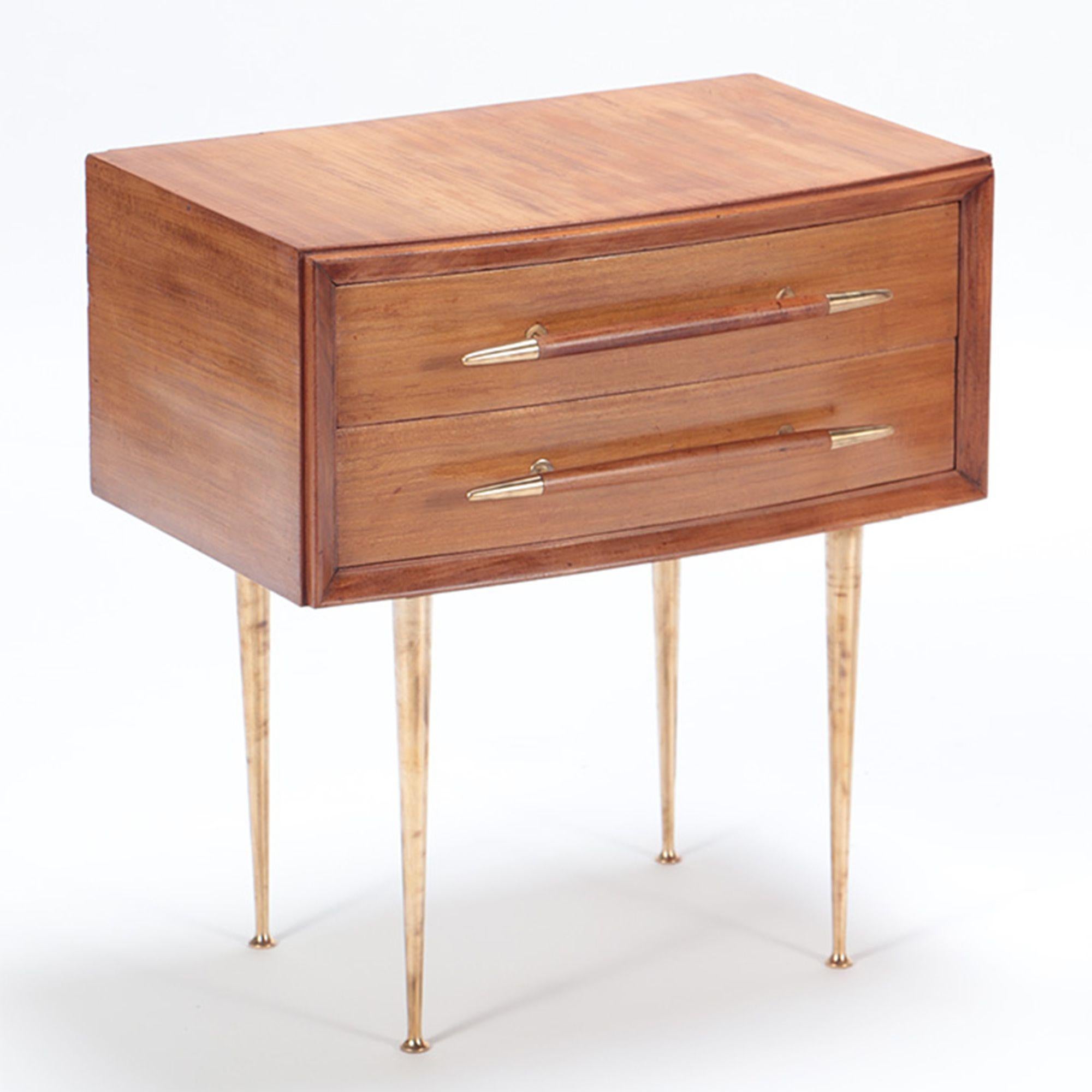 A pair of Mid-Century Modern walnut and brass night stands in the manner of T.H. Robsjohn Gibbings. circa 1955.