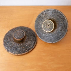 A pair of Mid-Century Oversized Schlage Mayan Door Knob and Escutcheon Plate