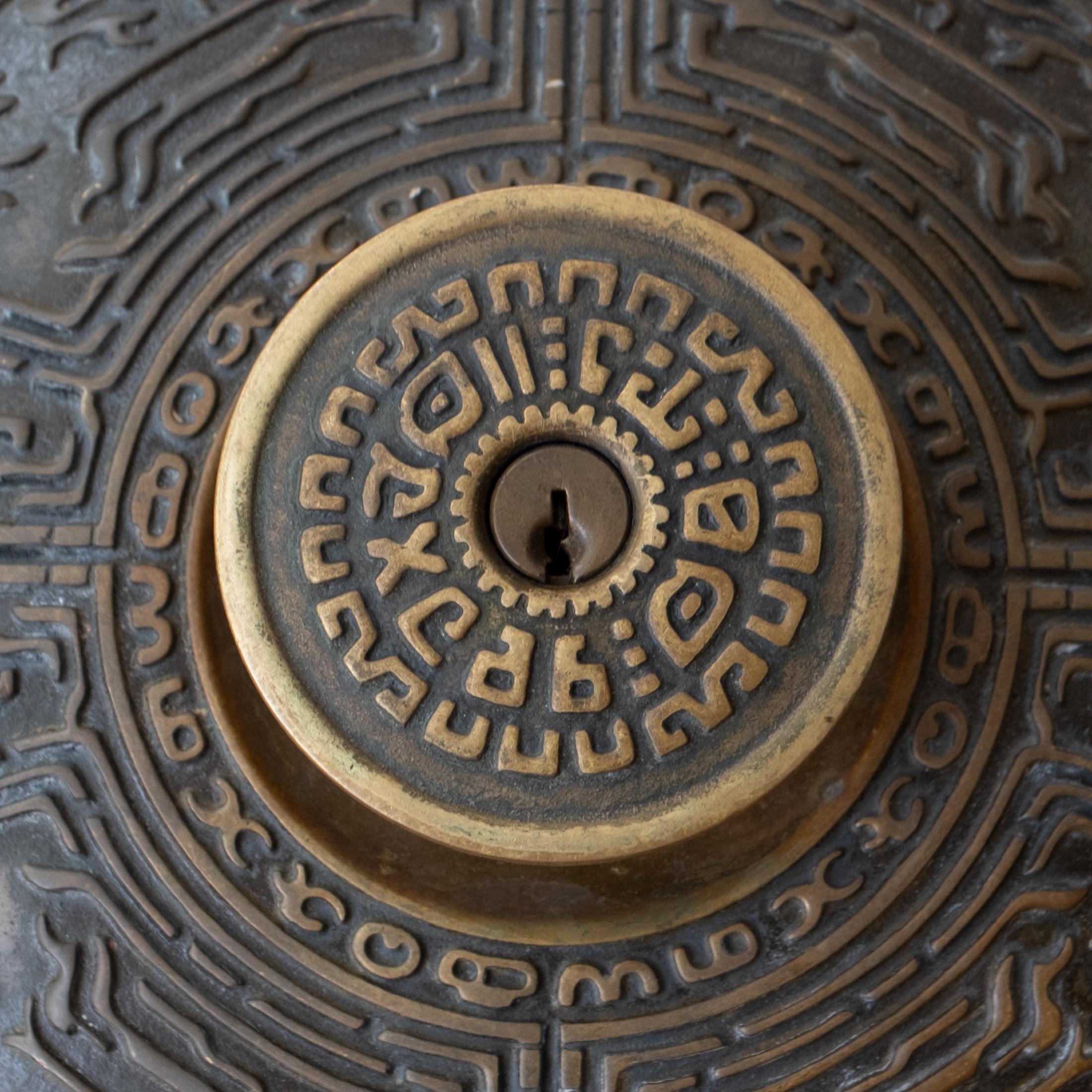Bronze A pair of Mid-Century Oversized Schlage Mayan Door Knob and Escutcheon Plate For Sale