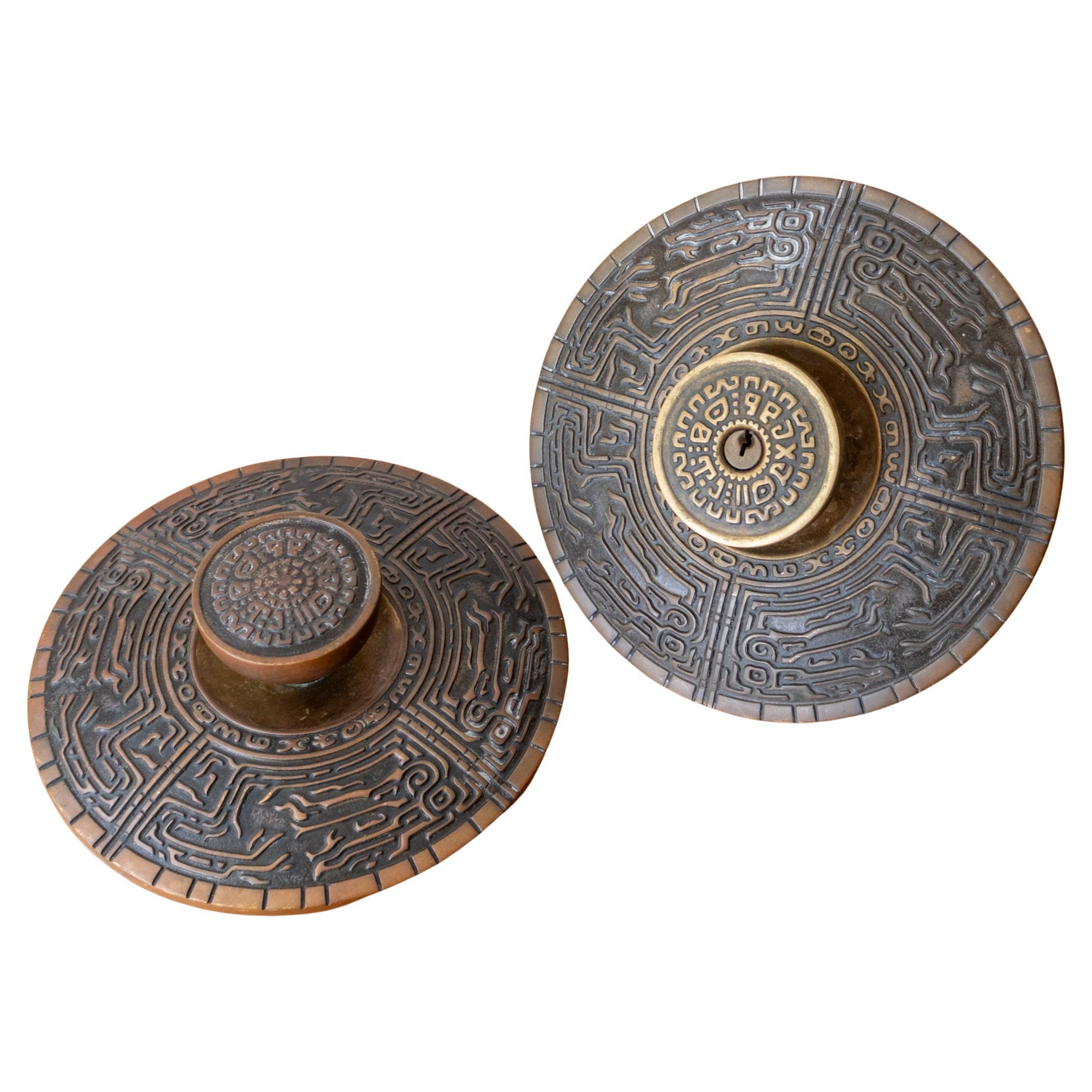 A pair of Mid-Century Oversized Schlage Mayan Door Knob and Escutcheon Plate For Sale