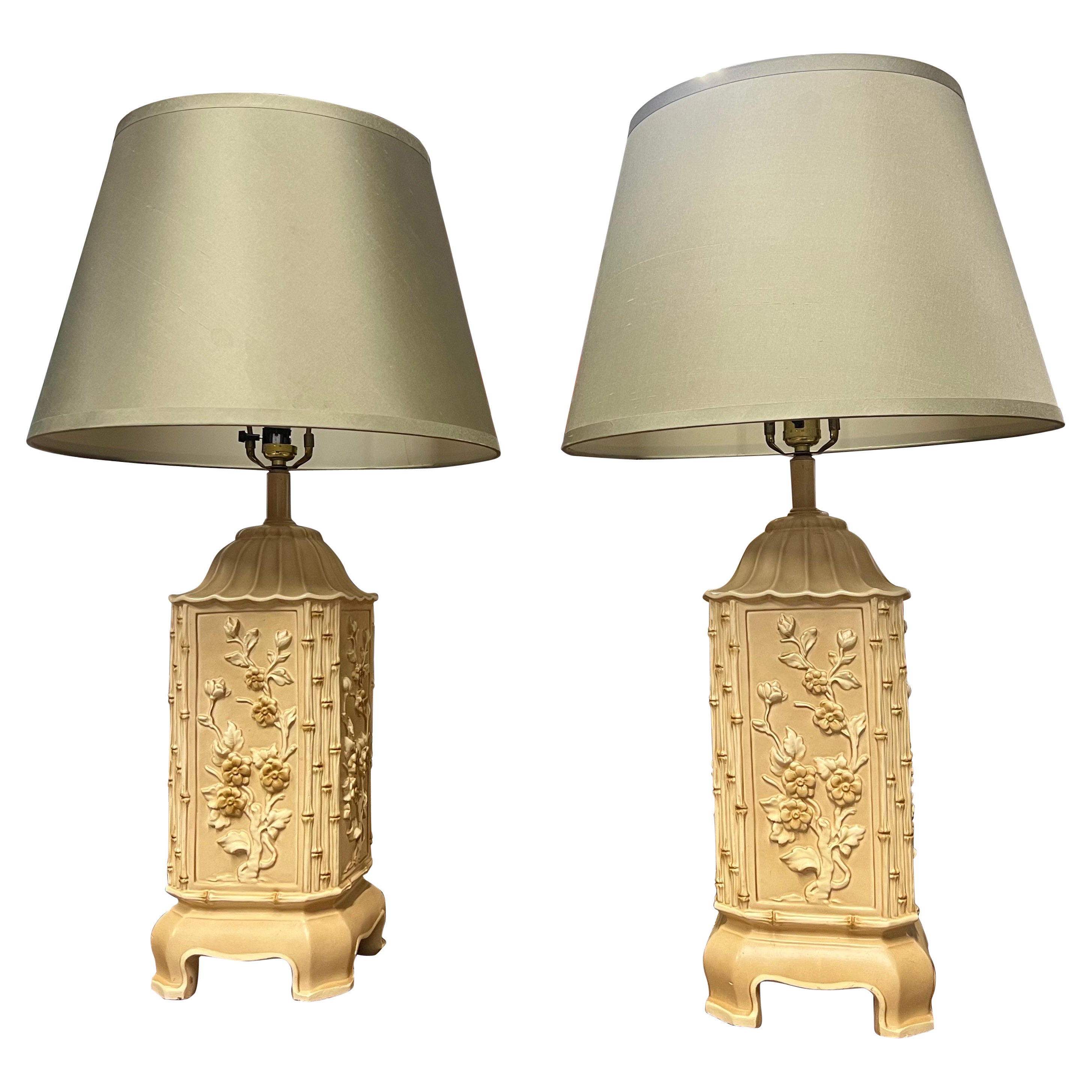 A pair of Mid-Century Pagoda Faux Bamboo Ceramic Lamps