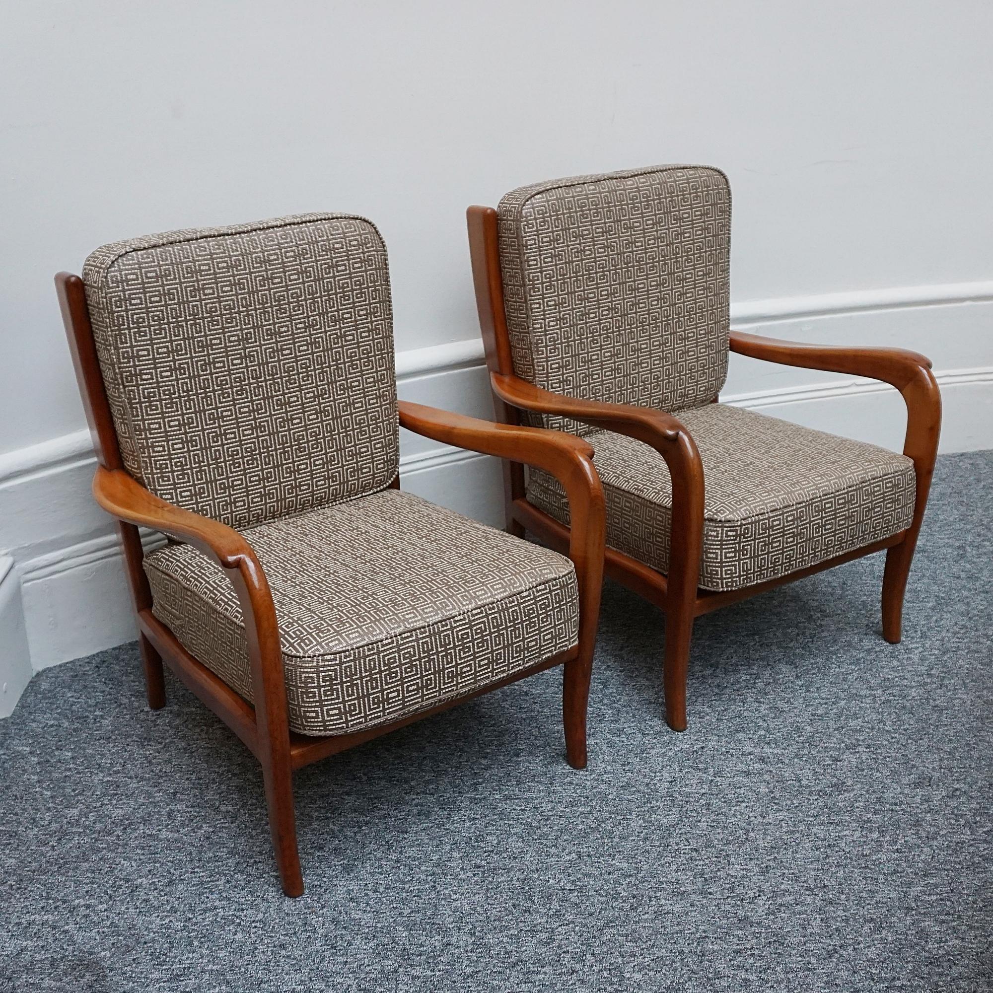 A pair of Mid-Century armchairs by Paolo Buffa. Cherry wood frame with a patterned fabric re-upholstery. 

Dimensions: H 80cm W 62cm D 62cm Sest H 42cm W 50cm D 50cm

Origin: Italian

Date: Circa 1950

Item Number: 2302243

All of our furniture is