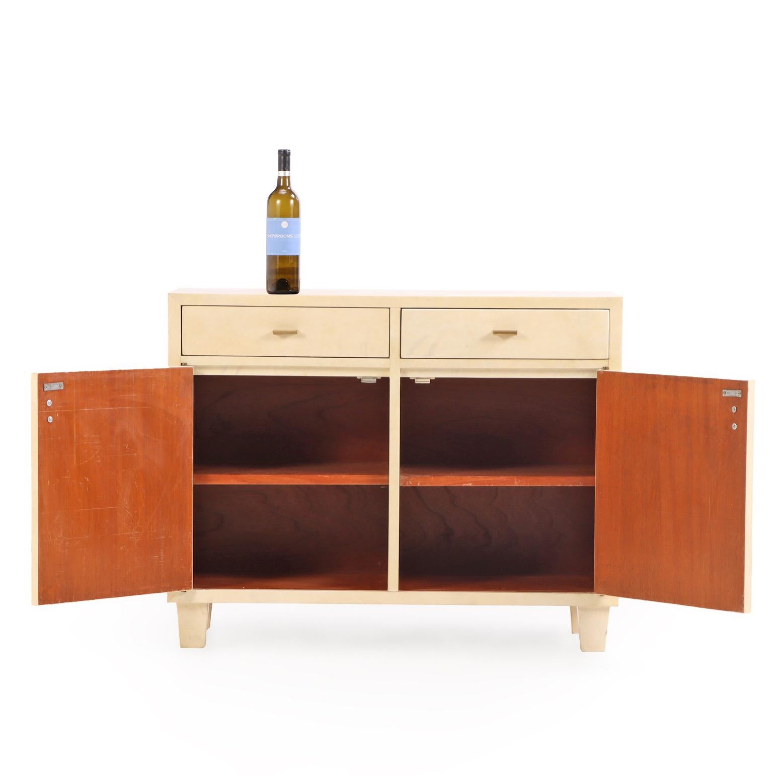Mid-Century Modern A Pair of Mid-Century Parchment-Covered Cabinets, C. 1960. For Sale