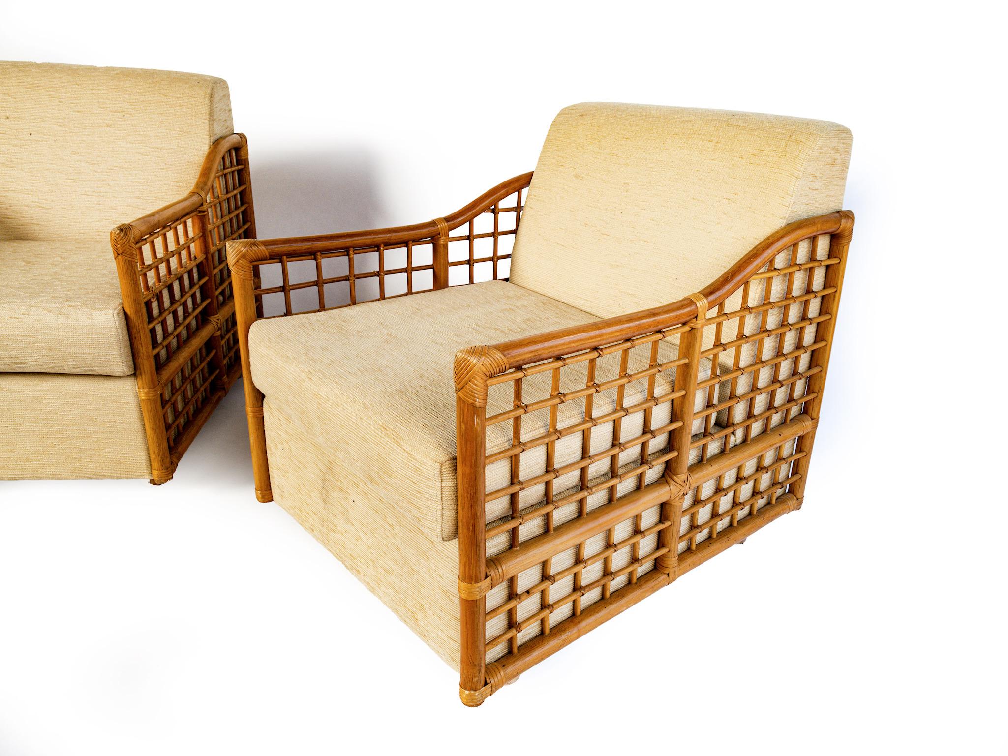 A pair of very comfortable mid century rattan lounge chairs/fauteuils.