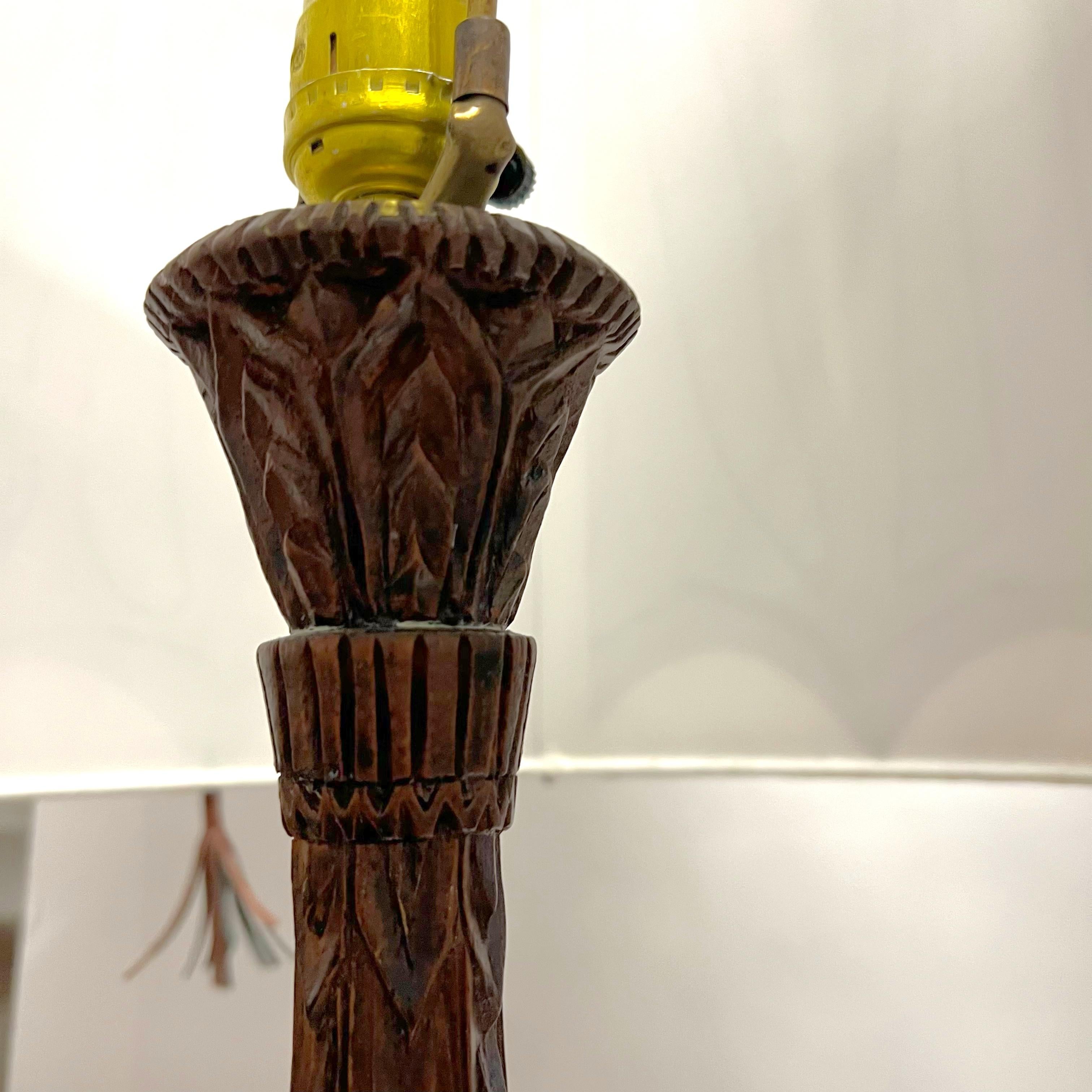 A pair of Mid-Century Tall Carved Wood Relief Lamps With Leather and Fur Shades For Sale 7