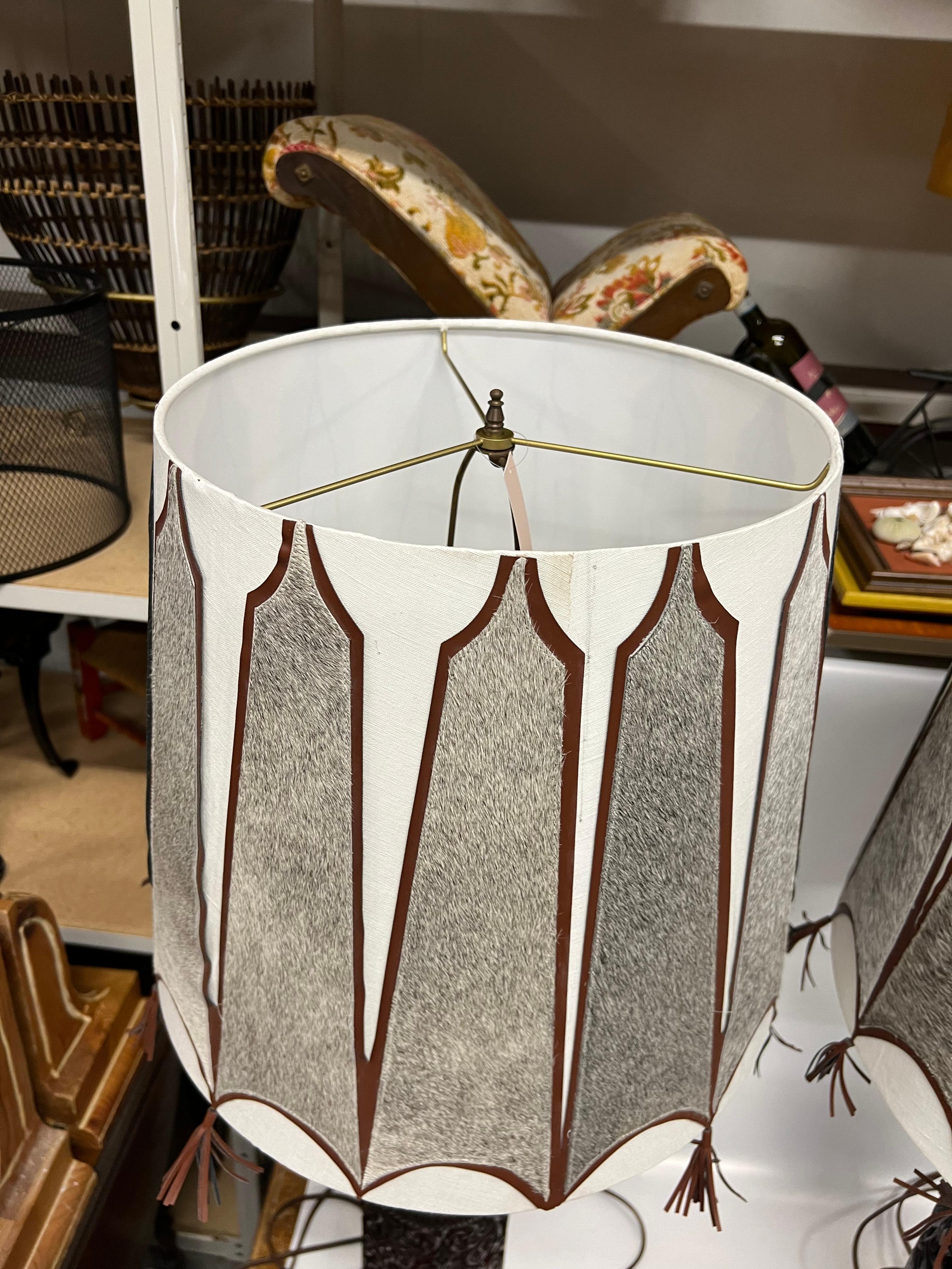 A pair of Mid-Century Tall Carved Wood Relief Lamps With Leather and Fur Shades For Sale 9