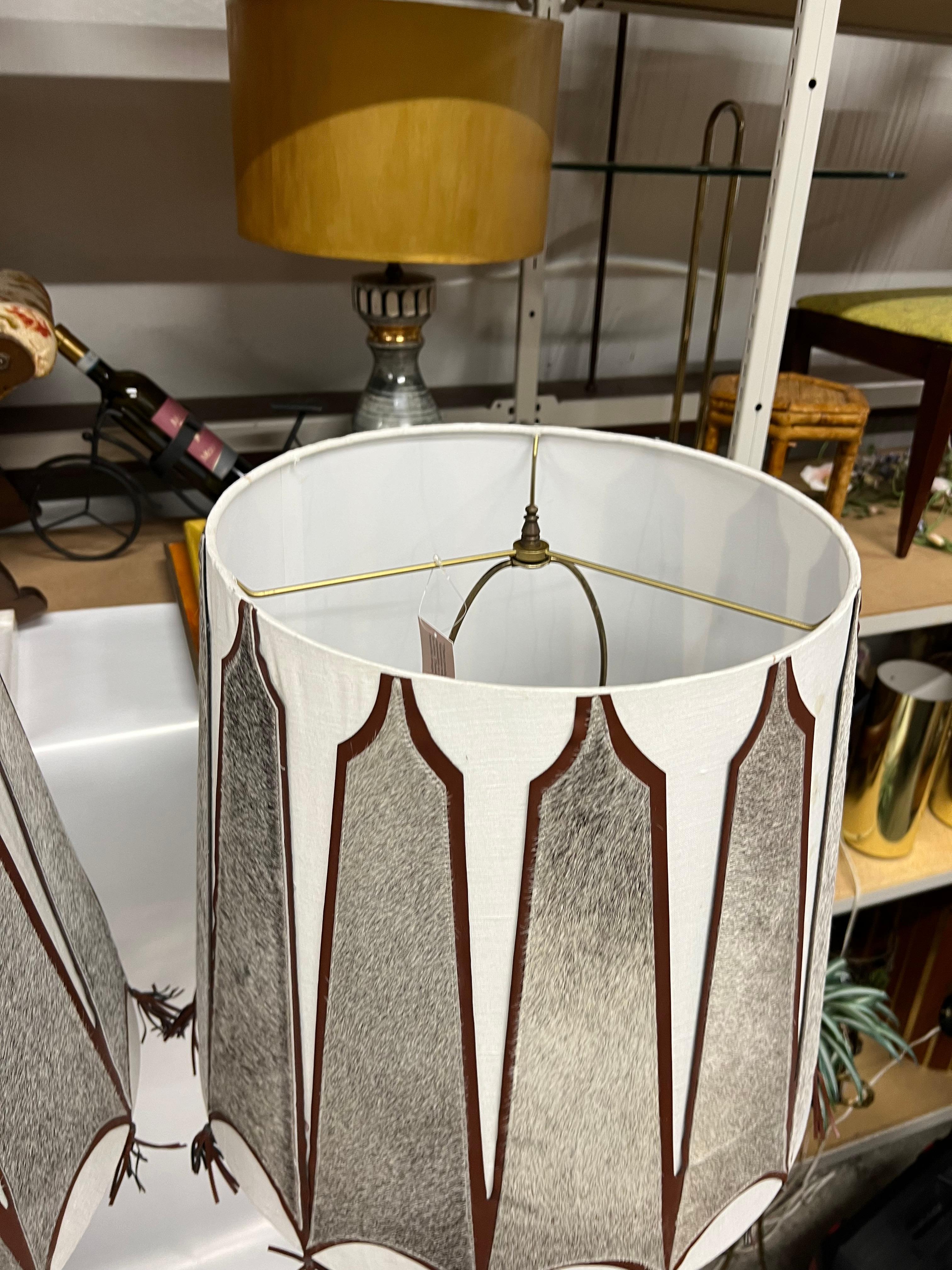 A pair of Mid-Century Tall Carved Wood Relief Lamps With Leather and Fur Shades For Sale 10