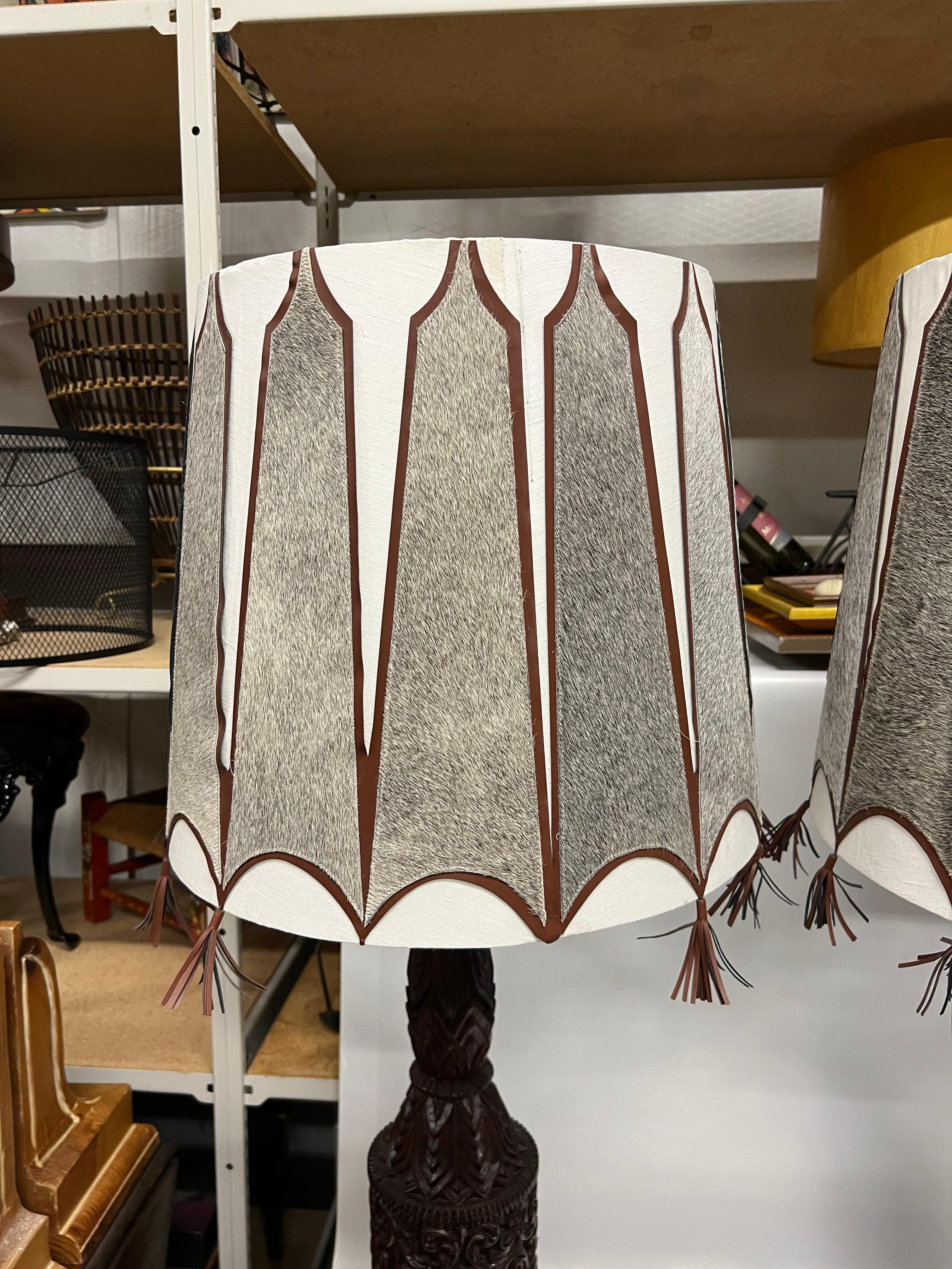 A pair of Mid-Century Tall Carved Wood Relief Lamps With Leather and Fur Shades For Sale 11