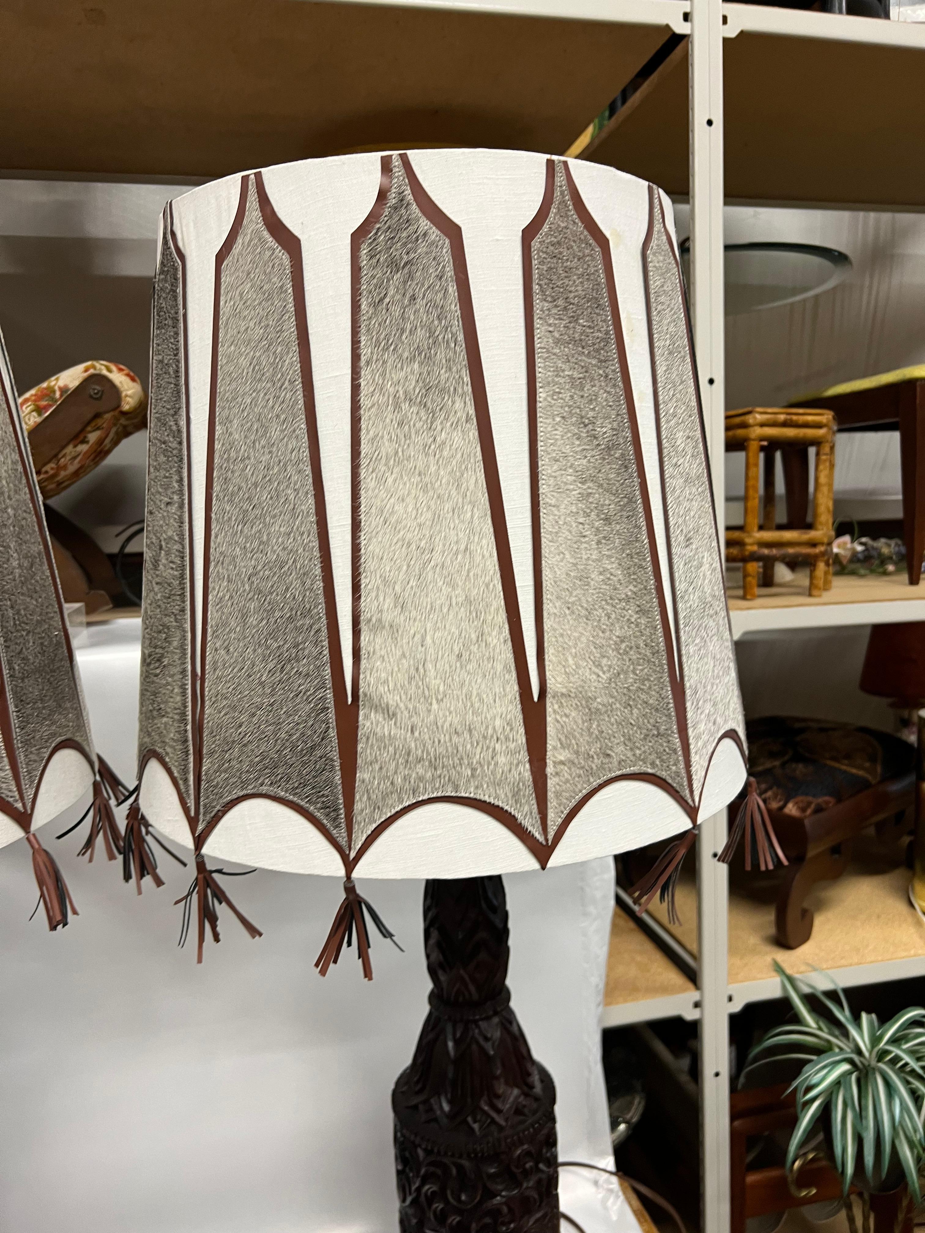 A pair of Mid-Century Tall Carved Wood Relief Lamps With Leather and Fur Shades For Sale 12
