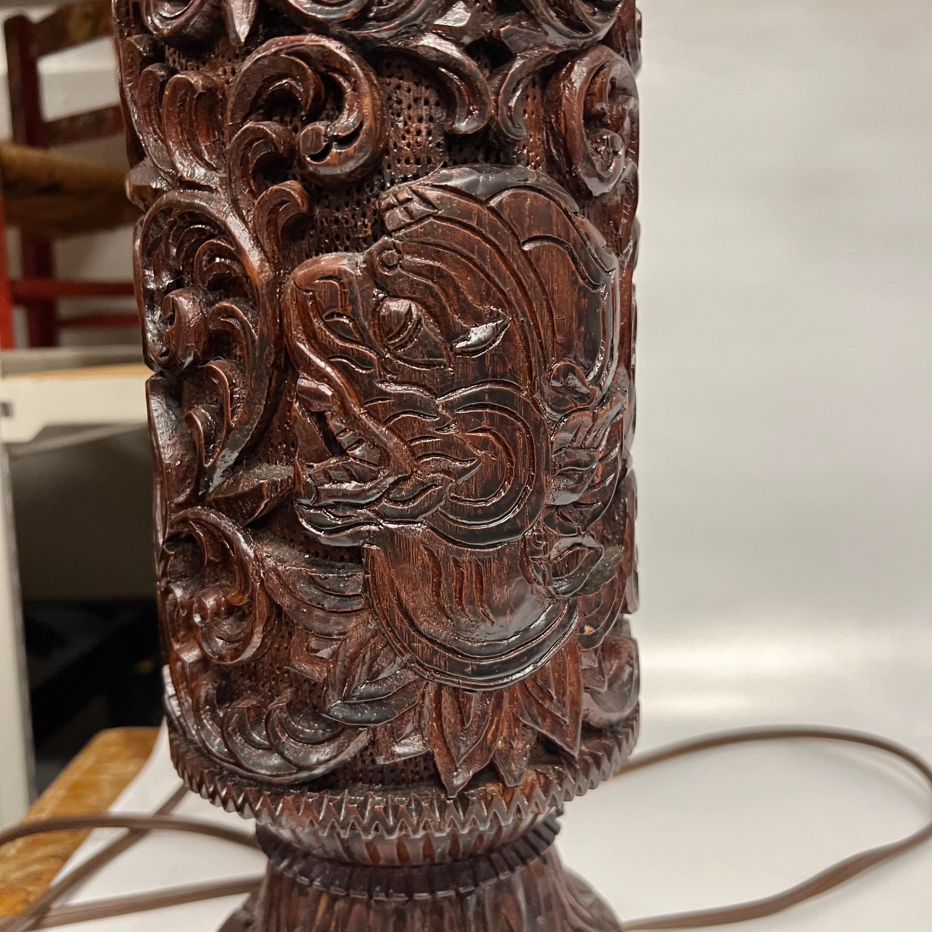 A pair of Mid-Century Tall Carved Wood Relief Lamps With Leather and Fur Shades For Sale 2