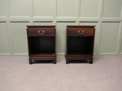 A pair of Mid Century Teak Oriental Style Cupboards or Night Tables