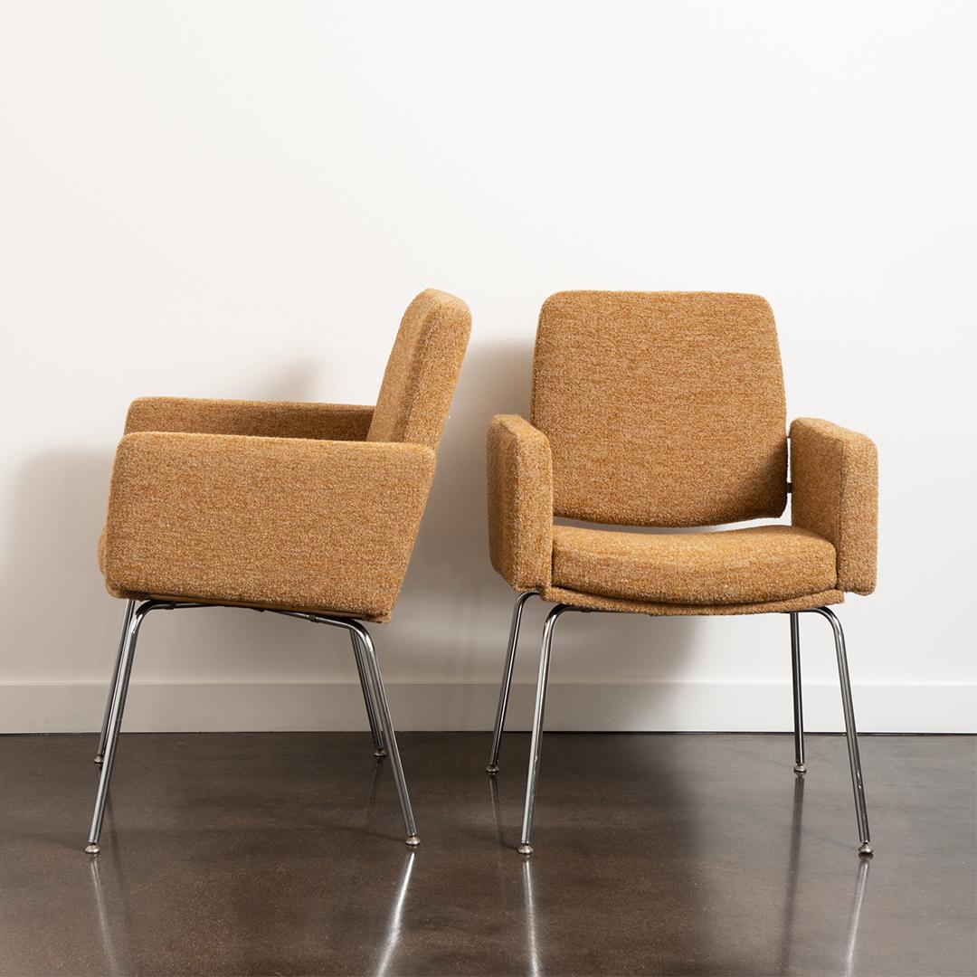 A pair of vintage armchairs by JG Furniture with bent rod chrome legs reupholstered in a Jed Home wool and mohair blend. The floating backrest and fully upholstered arms offer comfort in any modern space.