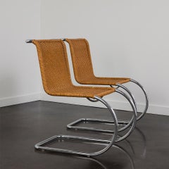 A Pair of Mies van der Rohe 'MR20' Cantilevered Chairs