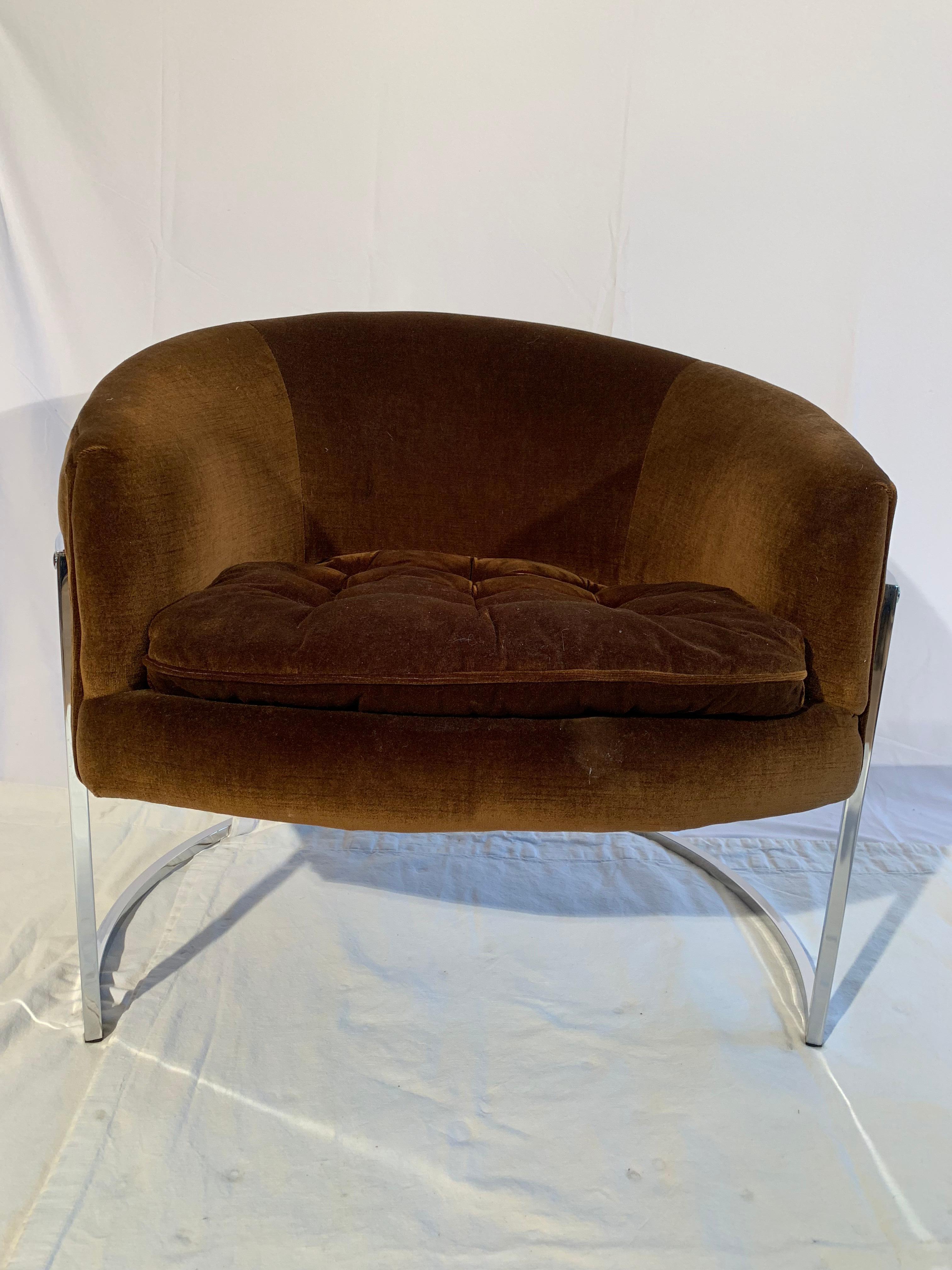 These chairs are a very comfy and a generous size. The chair seems to float above the thin chrome frame. The fabric is original and in very good condition, however an updated upholstery is recommended. The chrome frames are in excellent condition.