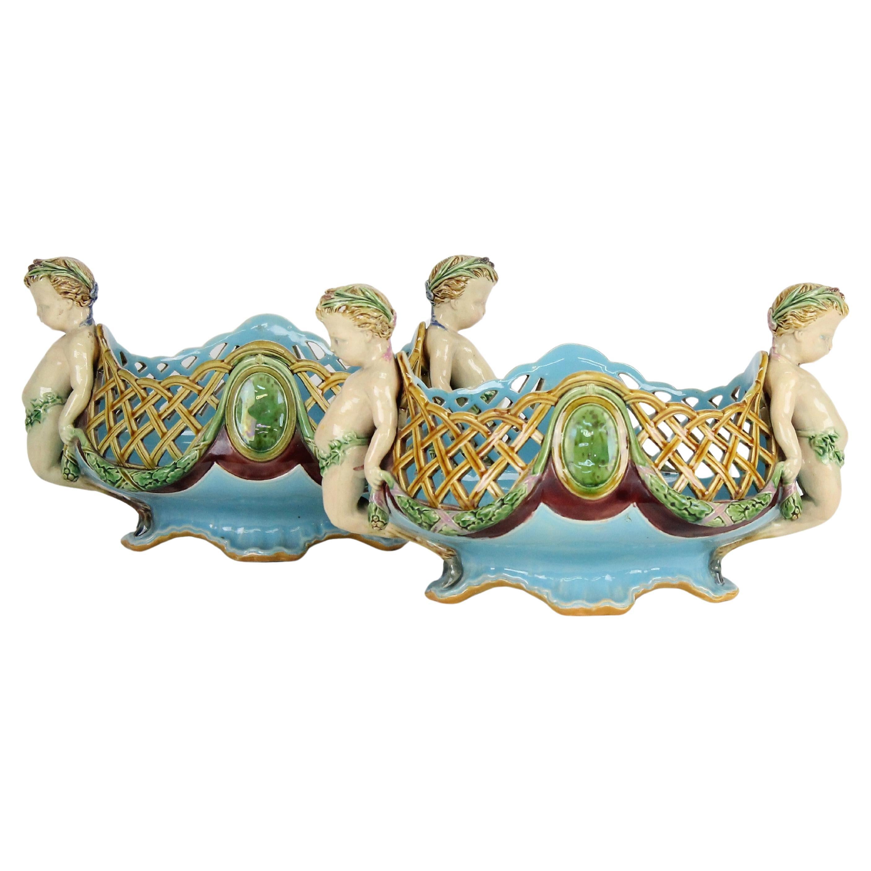 A pair of Minton Majolica Reticulated Baskets, designed by Albert-Ernest Carrier-Belleuse (1824-1887).
Excellent condition on both pieces, no issues!
Made in lead-glazed earthenware (Mintons 
