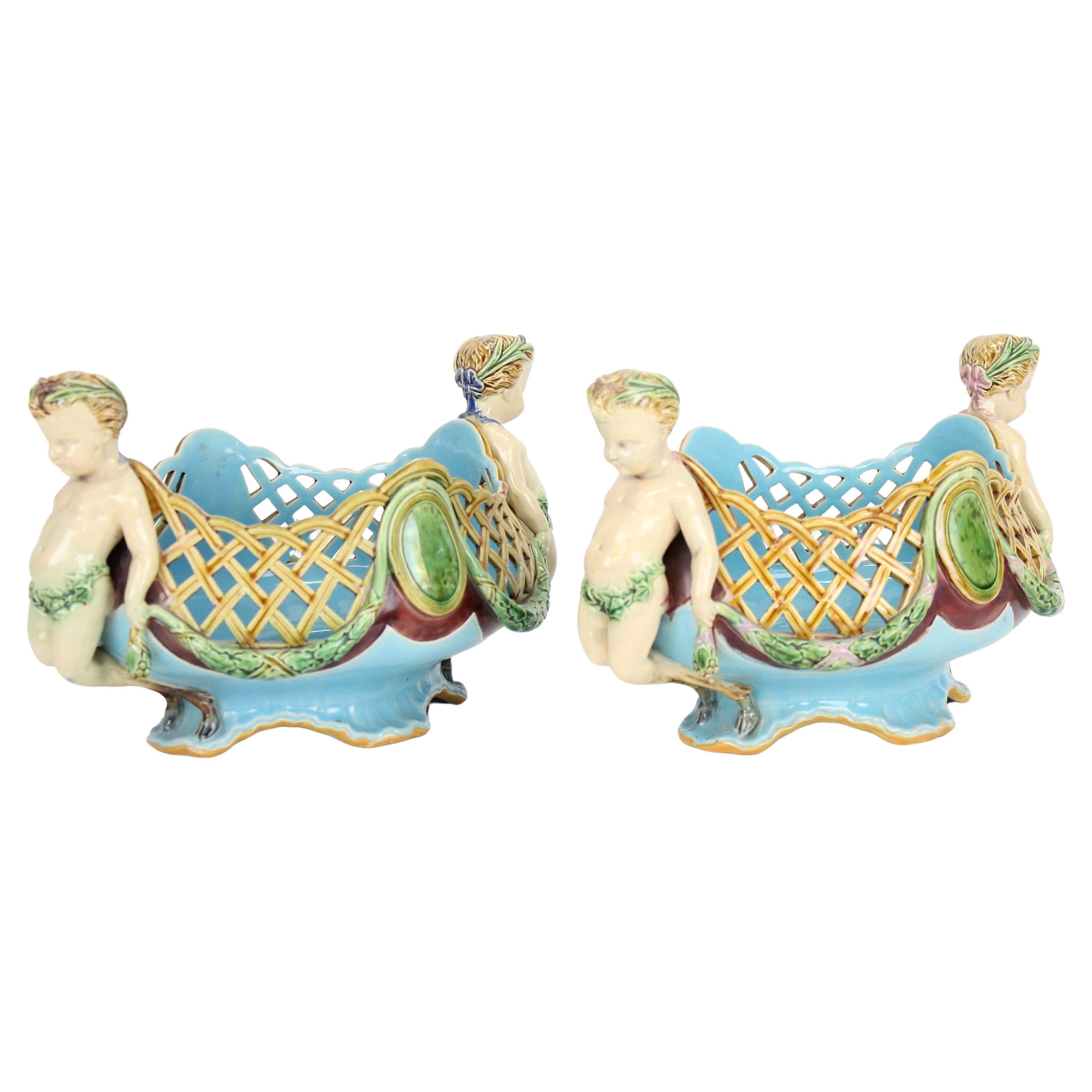 A Pair of Minton Majolica Baskets or Jardinieres by Albert Carrier-Belleuse.