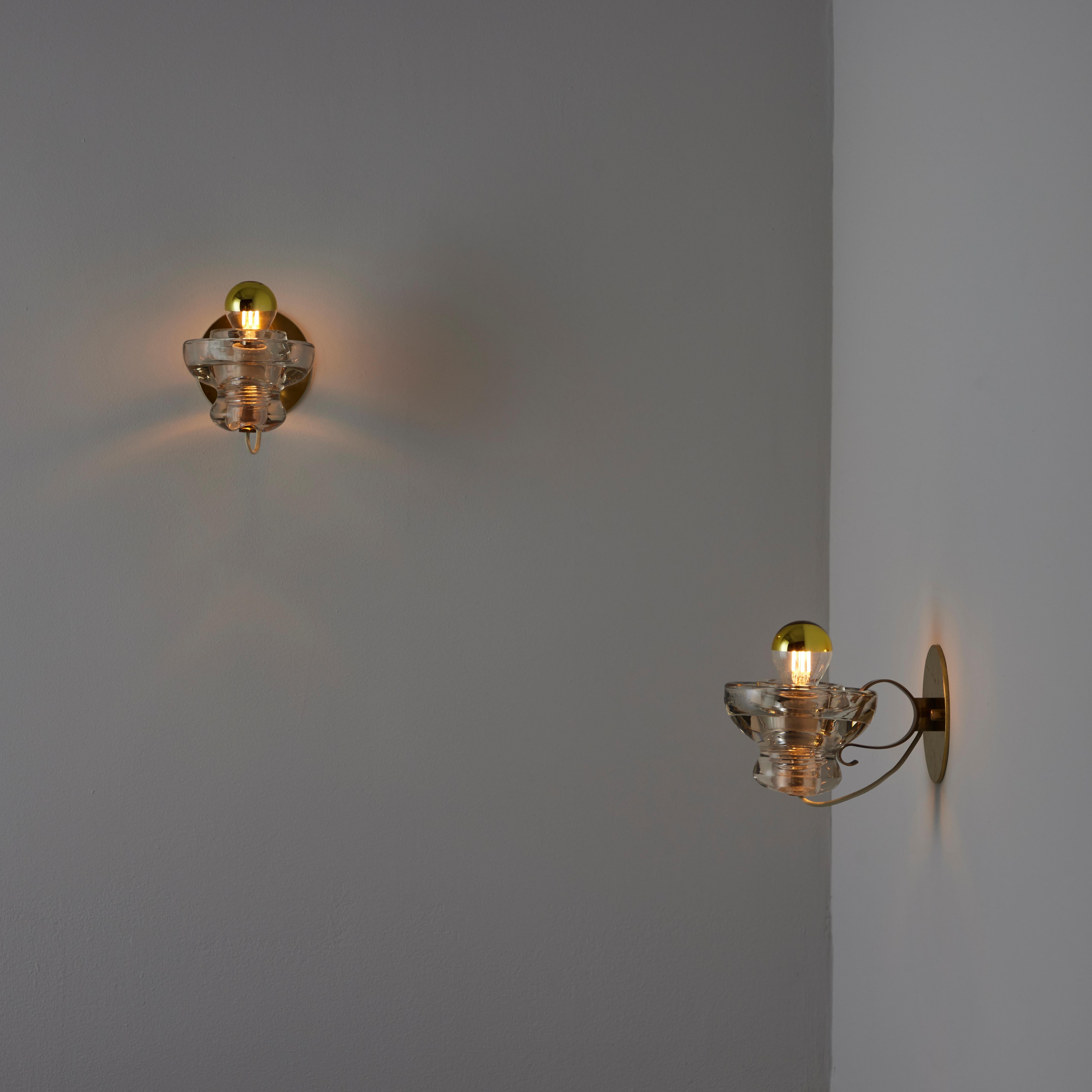 A Pair of Model 1129 Sconces by Tito Agnoli for Oluce 6