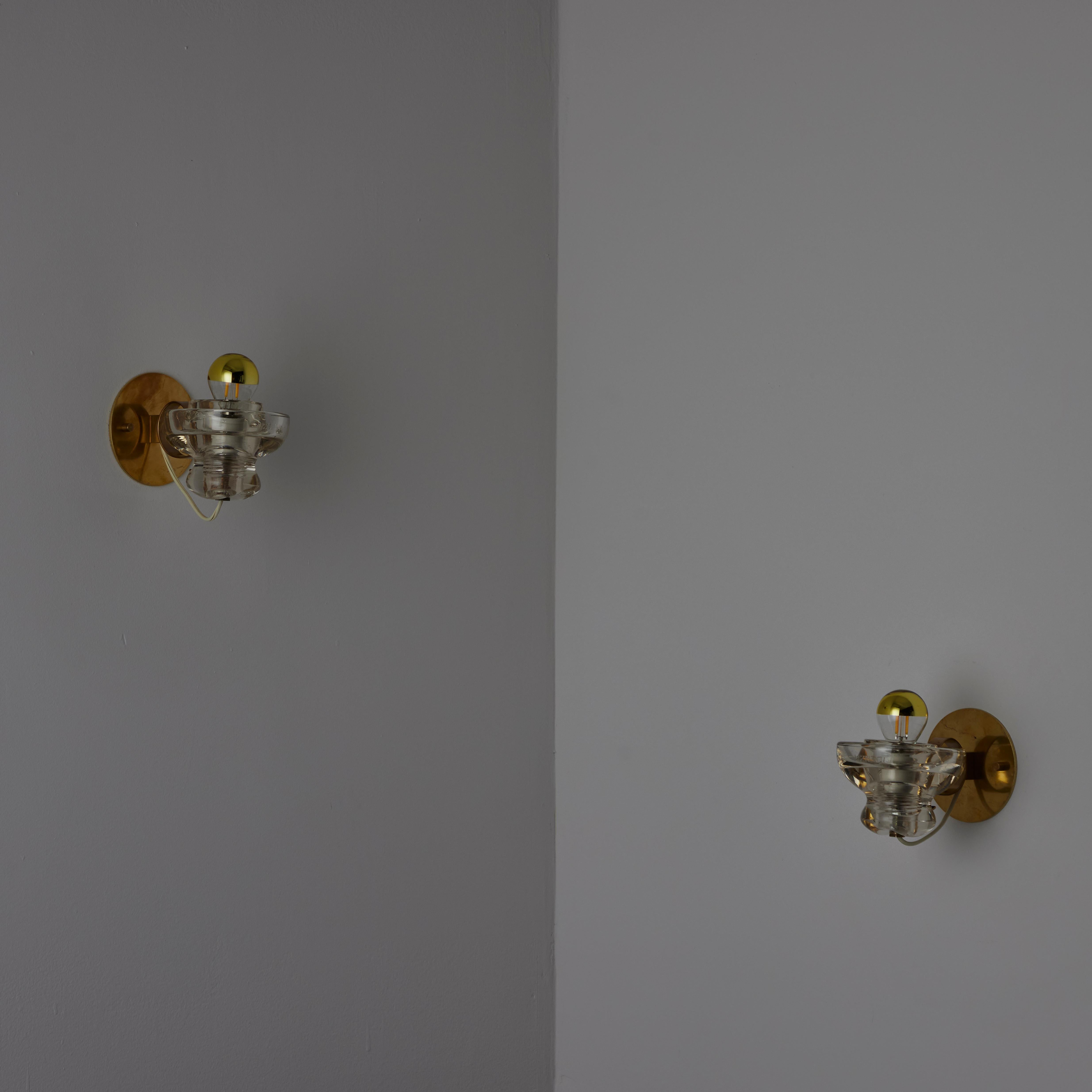 Mid-Century Modern A Pair of Model 1129 Sconces by Tito Agnoli for Oluce