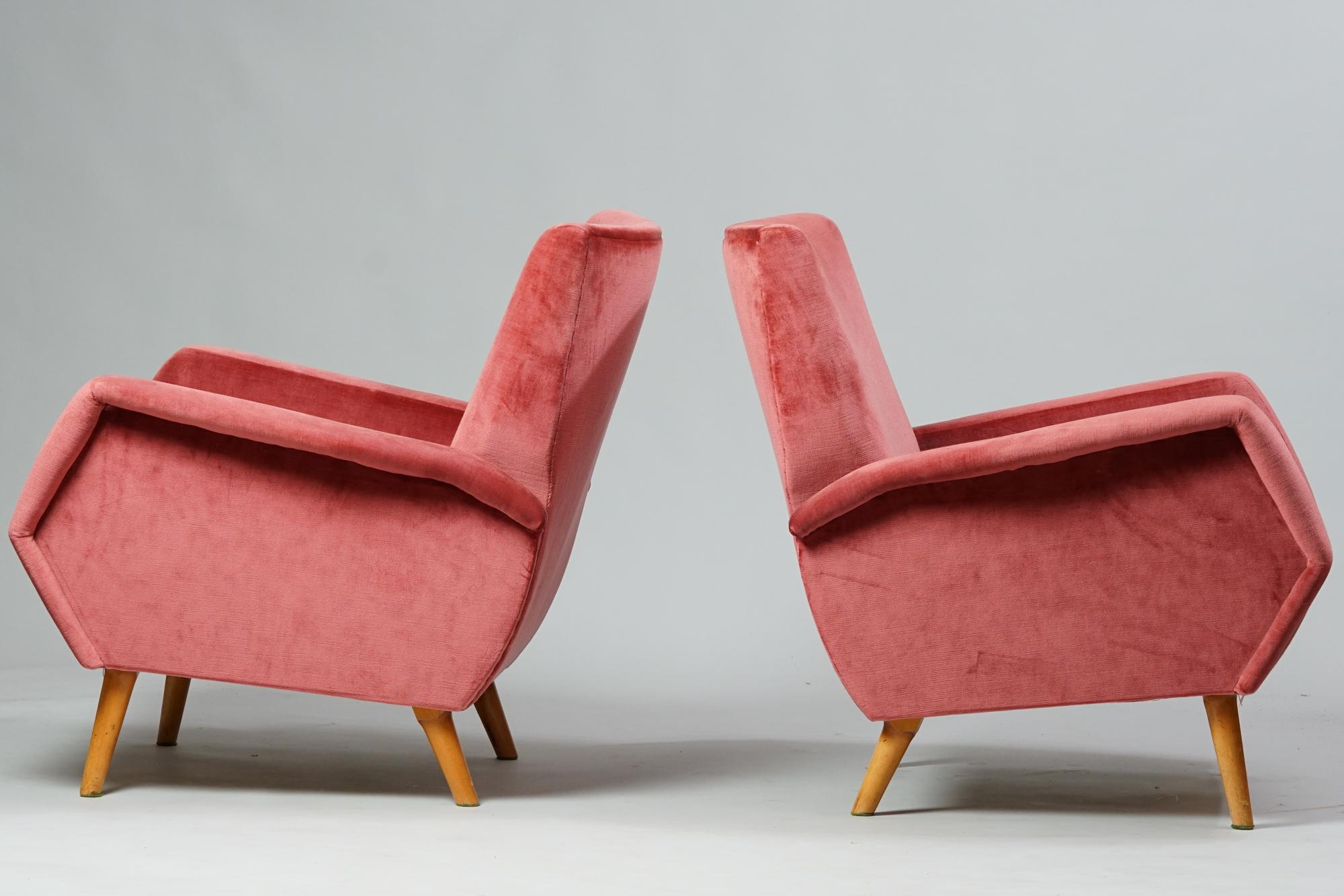 A Pair of model 803 armchairs by Gio Ponti for Cassina, 1950s. Oak and fabric upholstery. Good vintage condition, minor patina consistent with age and use. The armchairs are sold as a set. The model 803 armchairs were originally designed in 1954.