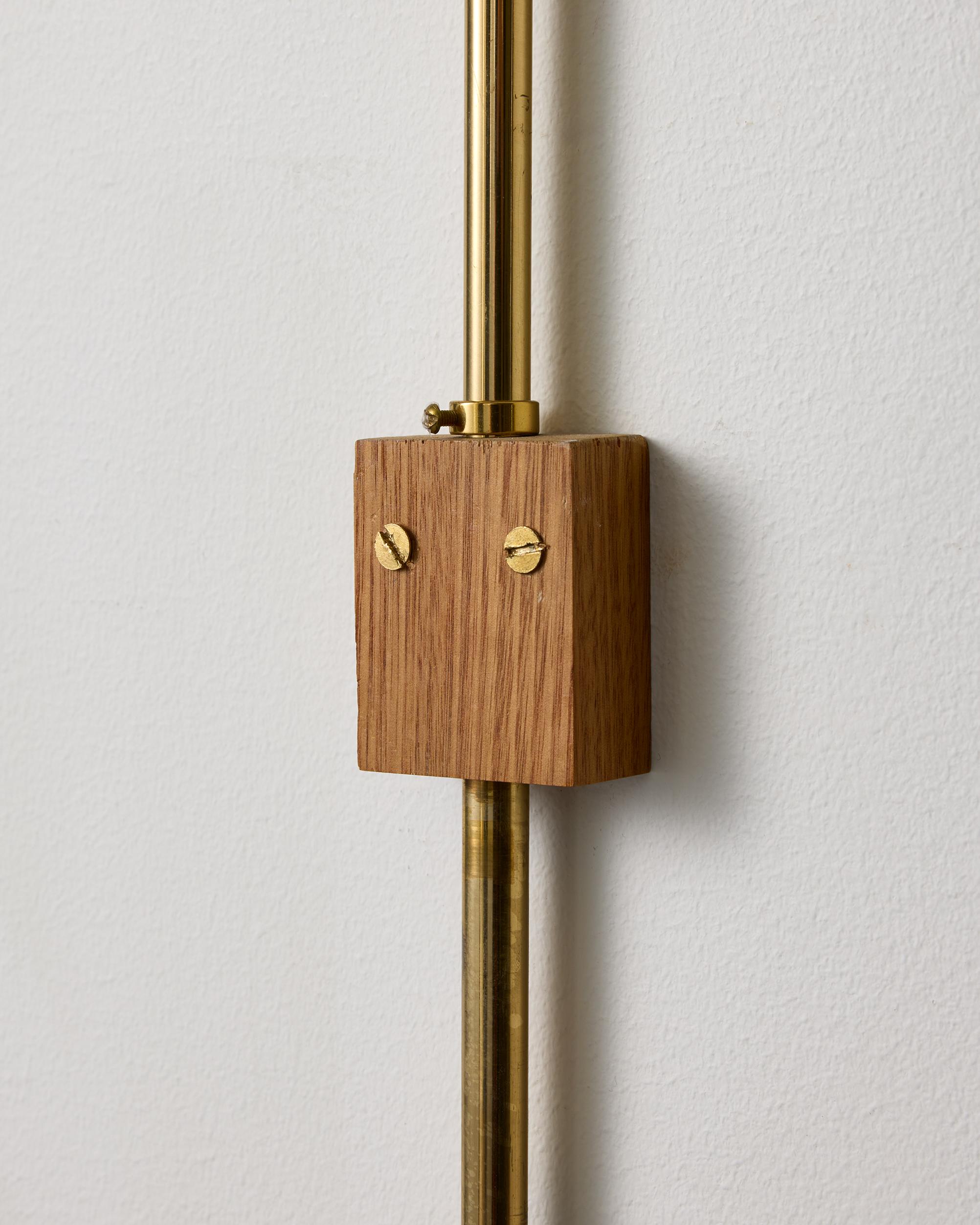 A pair of model V-75 wall lamps by Eje Ahlgren with Polished Brass Domes For Sale 4