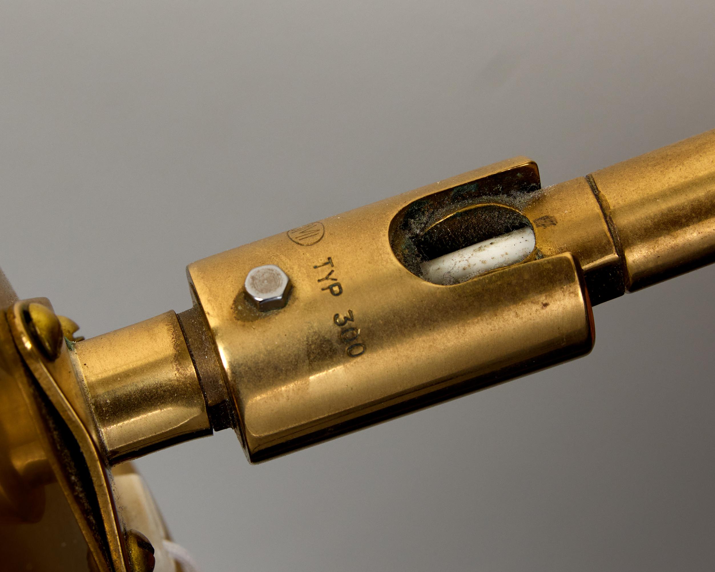 A pair of model V-75 wall lamps by Eje Ahlgren with Polished Brass Domes For Sale 5