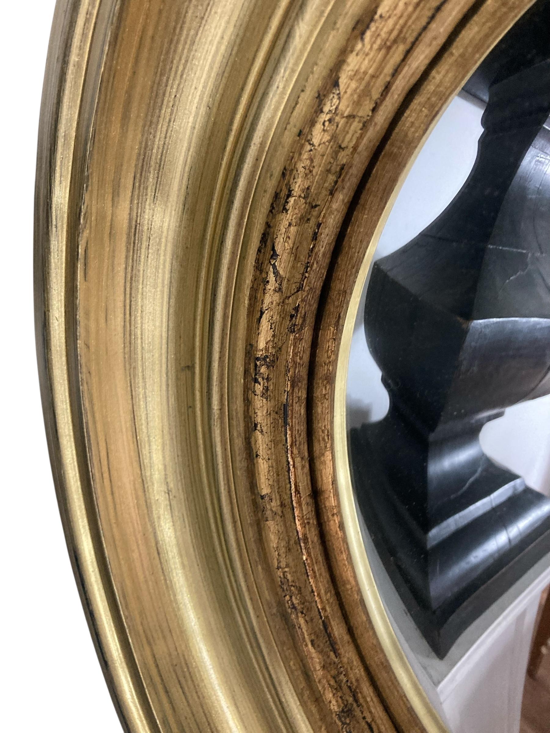 A Pair of Modern Regency Style Gold Circular Convex Mirrors with ebonsied Rim For Sale 7