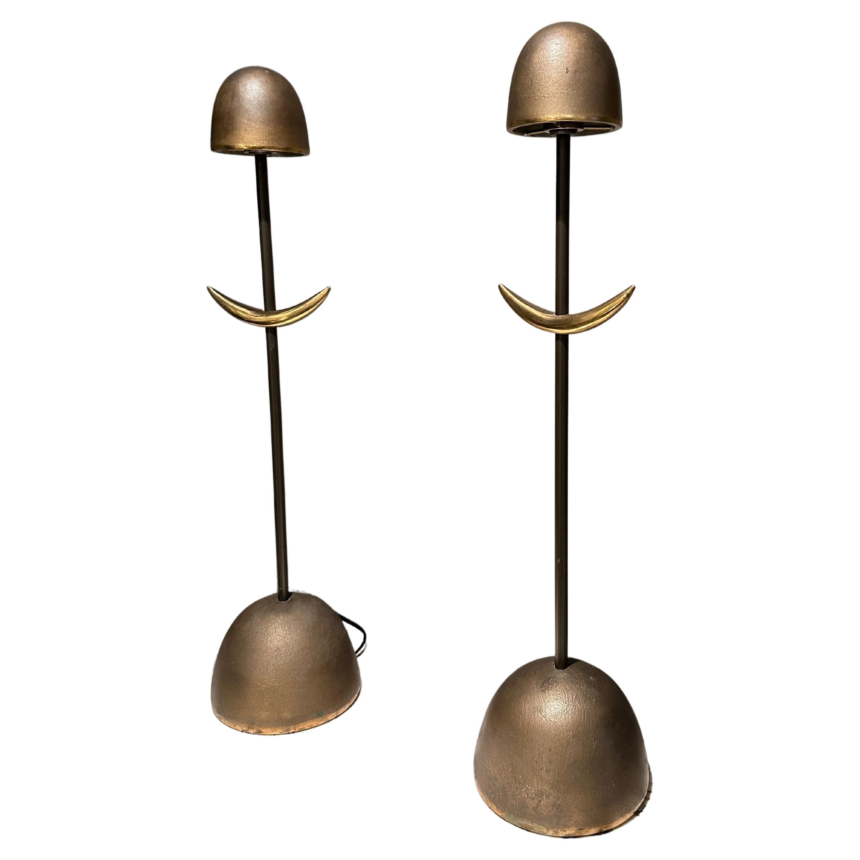 A pair of quality modernist table lamps in cast Bronze and Brass, by Dutch design duo Mies and Van Gessel produced by Quasar Holland. Known for taking their inspiration from nature and architecture, also for working with superior materials. 