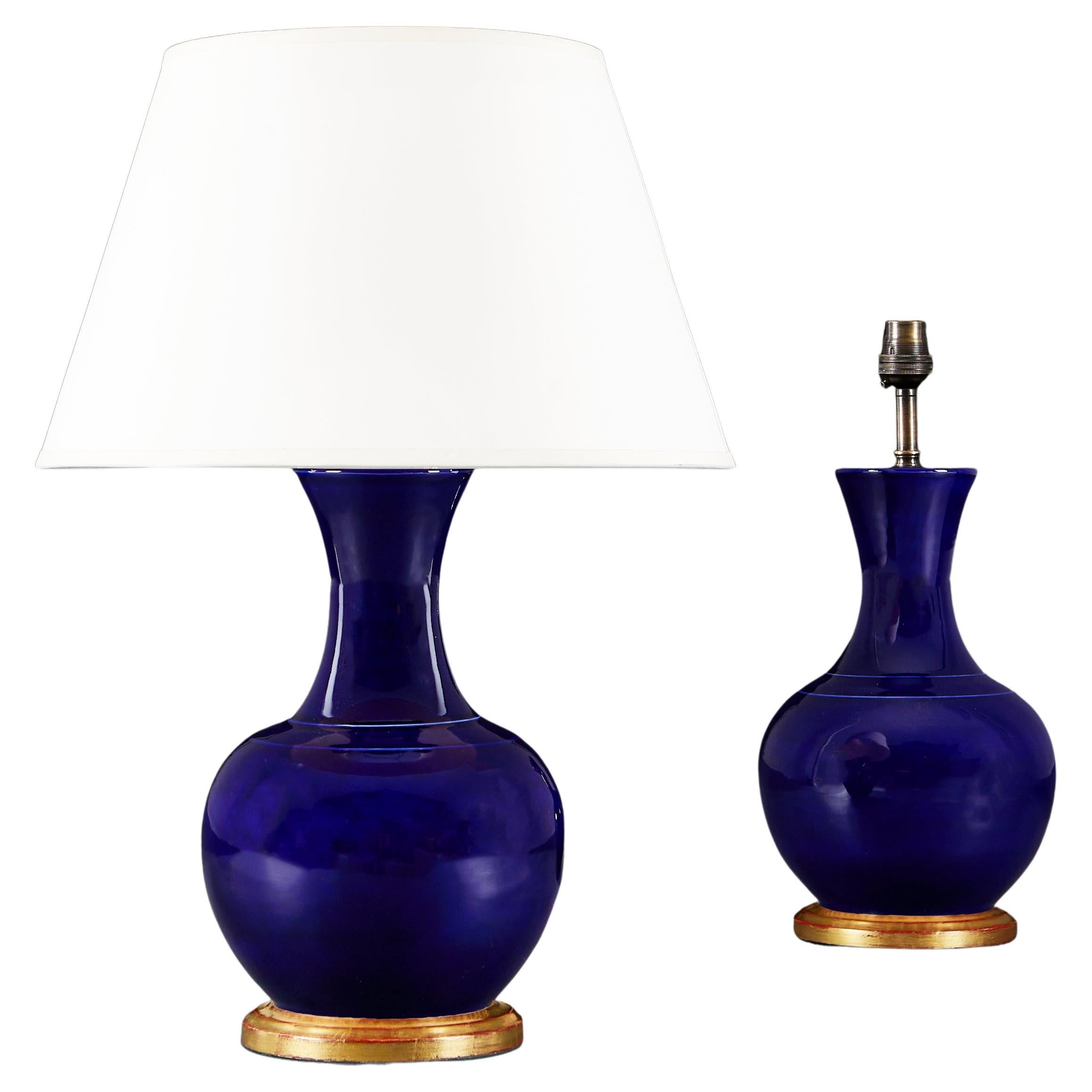 A Pair of Monochrome Blue Vases as Table Lamps with Giltwood Bases
