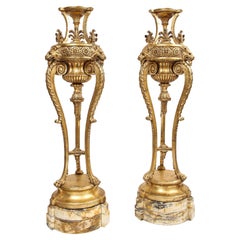 A Pair of Monumental 19th Century Giltwood Torchieres with Original Marble Bases