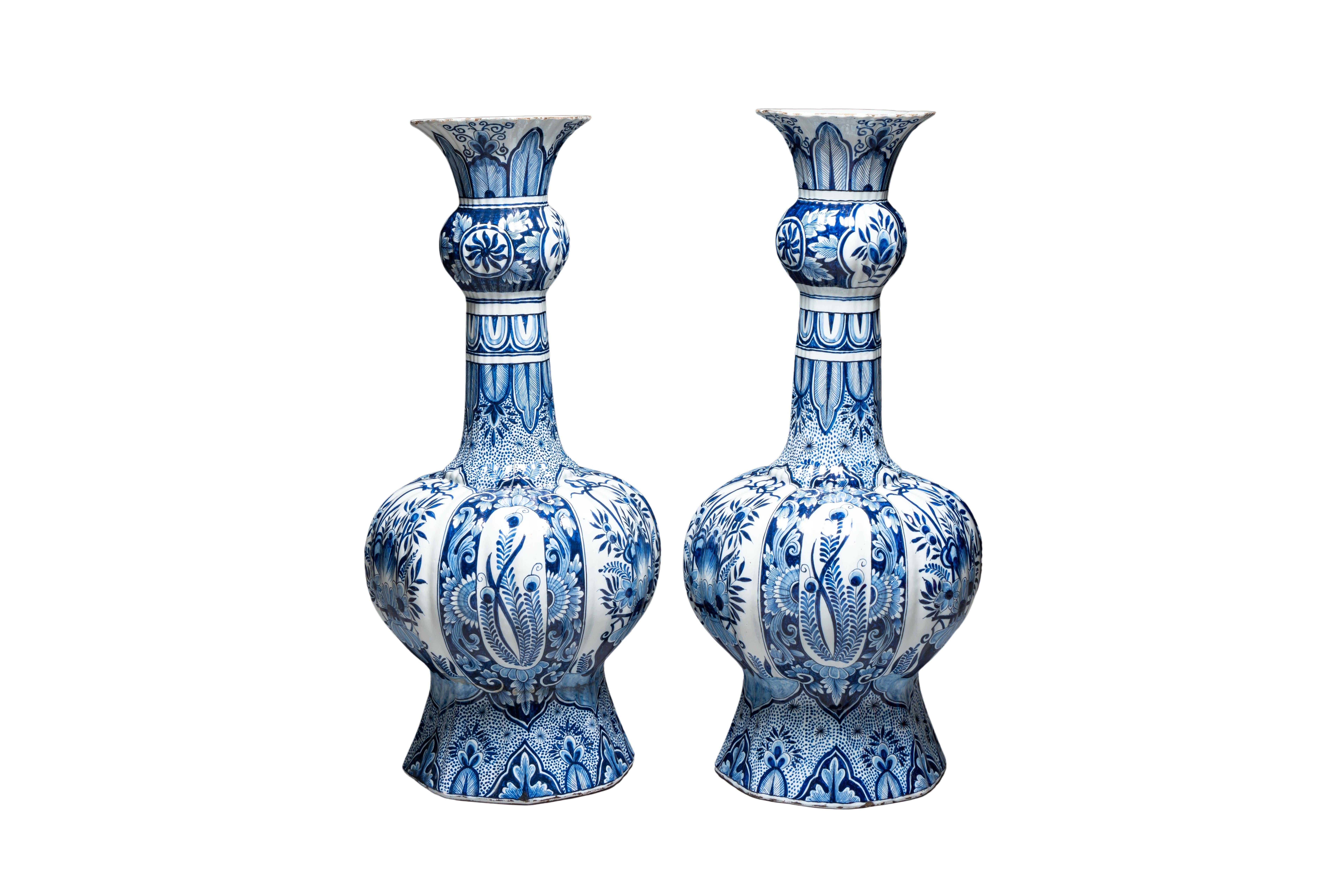A pair of monumental blue and white Delftware vases. 

This is the most exceptionally large pair of Delftware vases I have ever had in the collection. 
Their size is truly monumental of almost one meter high! (87cm) ( about 3 feet ! )

Imagine them
