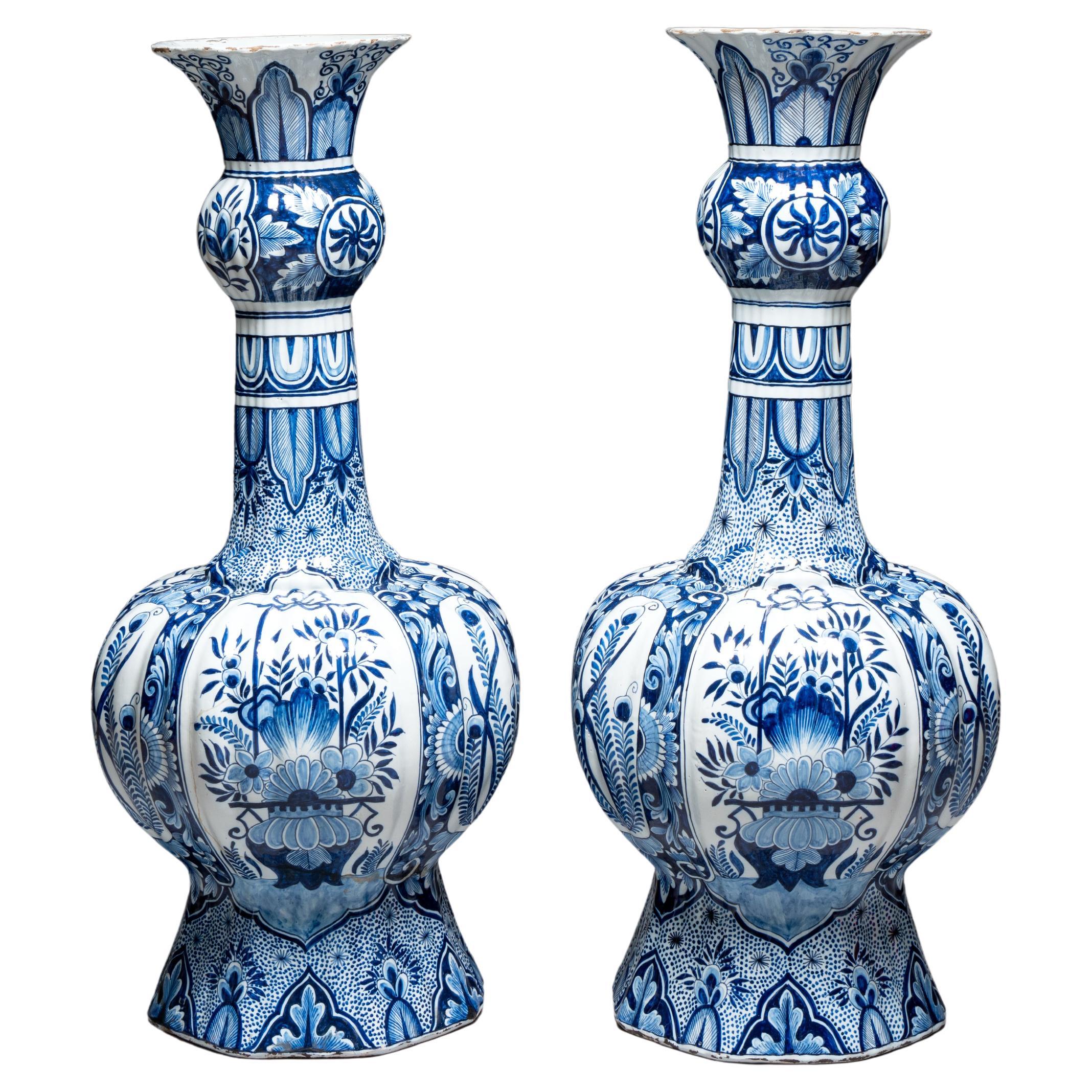 A pair of monumental blue and white Delftware vases from the 19th century For Sale